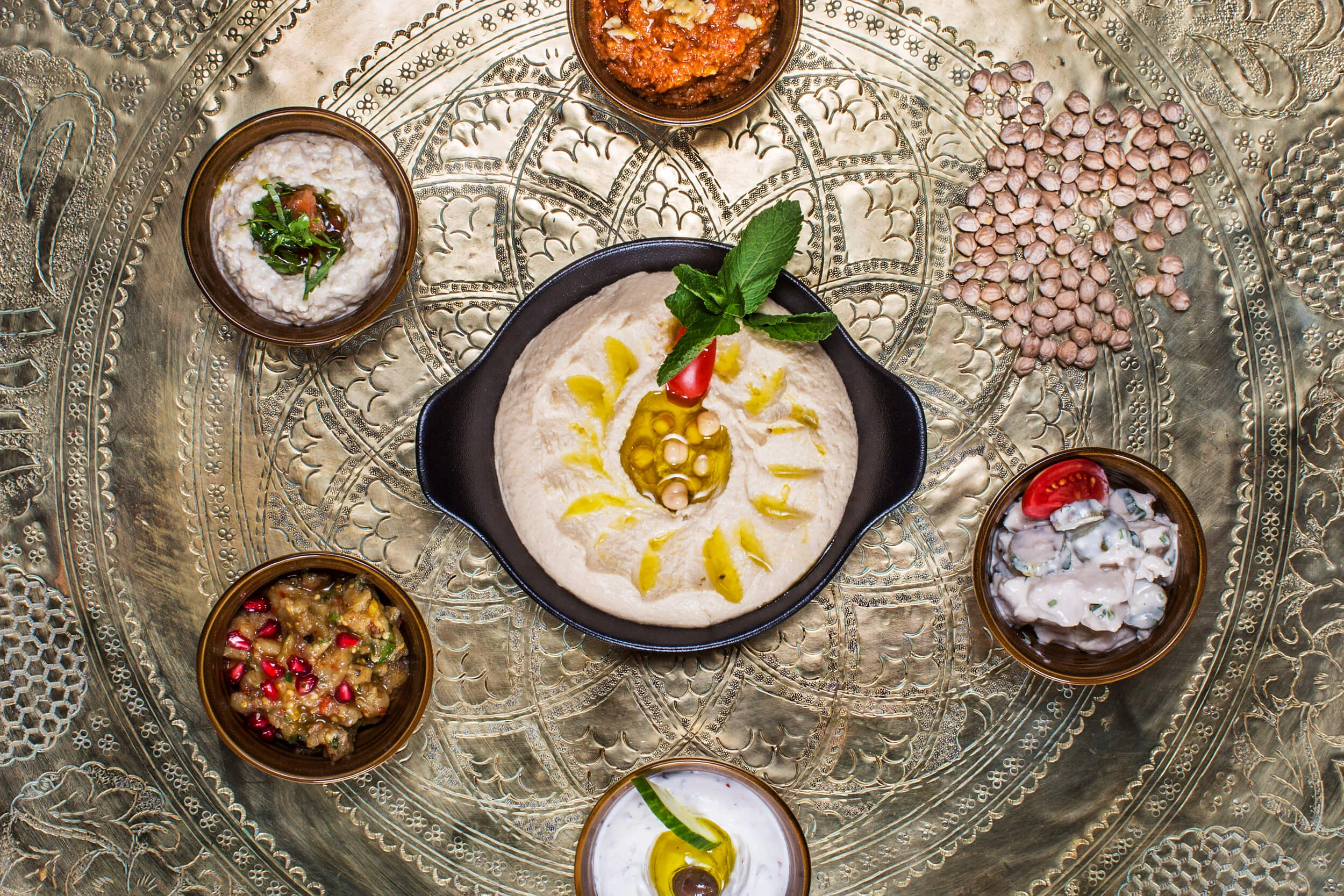 Cold Meze. Hummus. Stir on chickpeas and sesame pasta/tahina, seasoned with cumin.