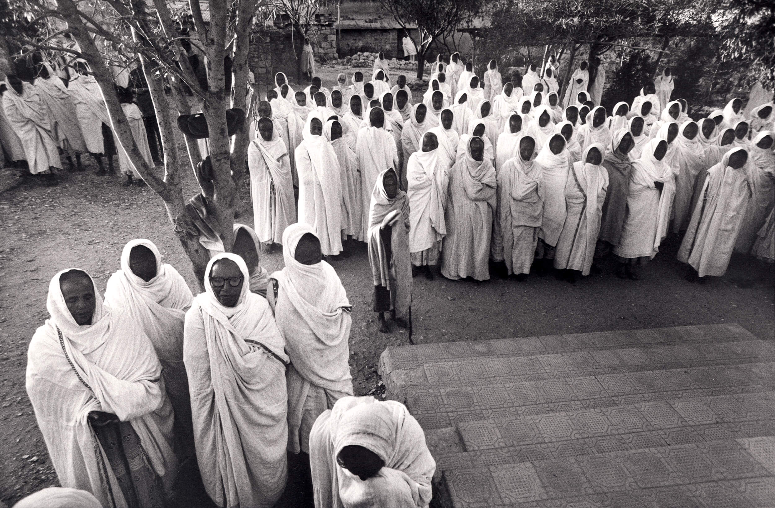  Christian orthodox ceremony in the dawn during the war. Adi Qaie, Eritrea 1990. 