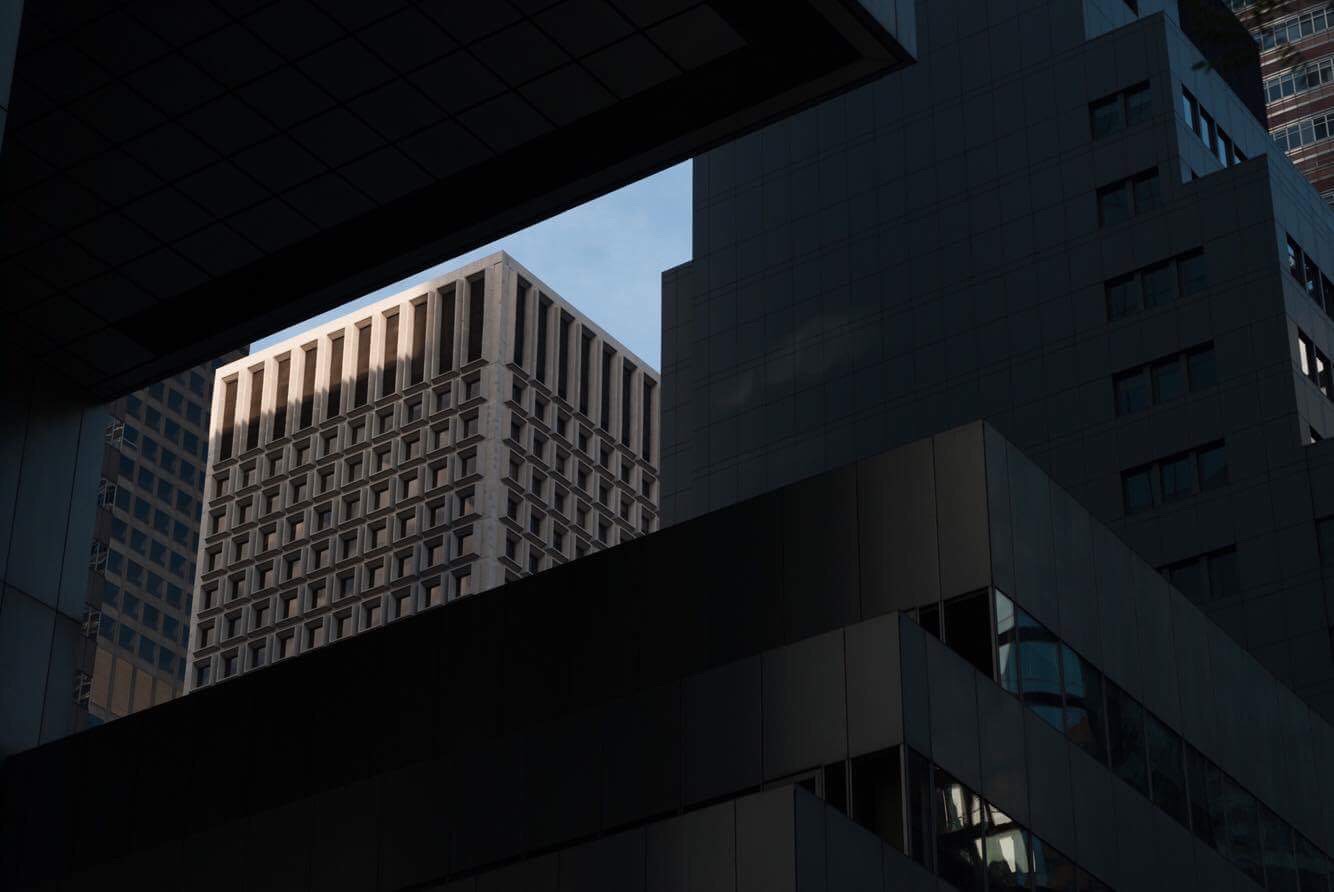 This sums up the photograph I’m naturally more inclined towards and these are all from walking around with no goal. For the first one, it was purely architecture. I like lines and shadows and how they work together and I think the tones are interesting in that you can see a small part of sunlight when shadows are coming in and out of the frame. Also who else would look up in NYC on their way to dinner and notice that (chuckles).