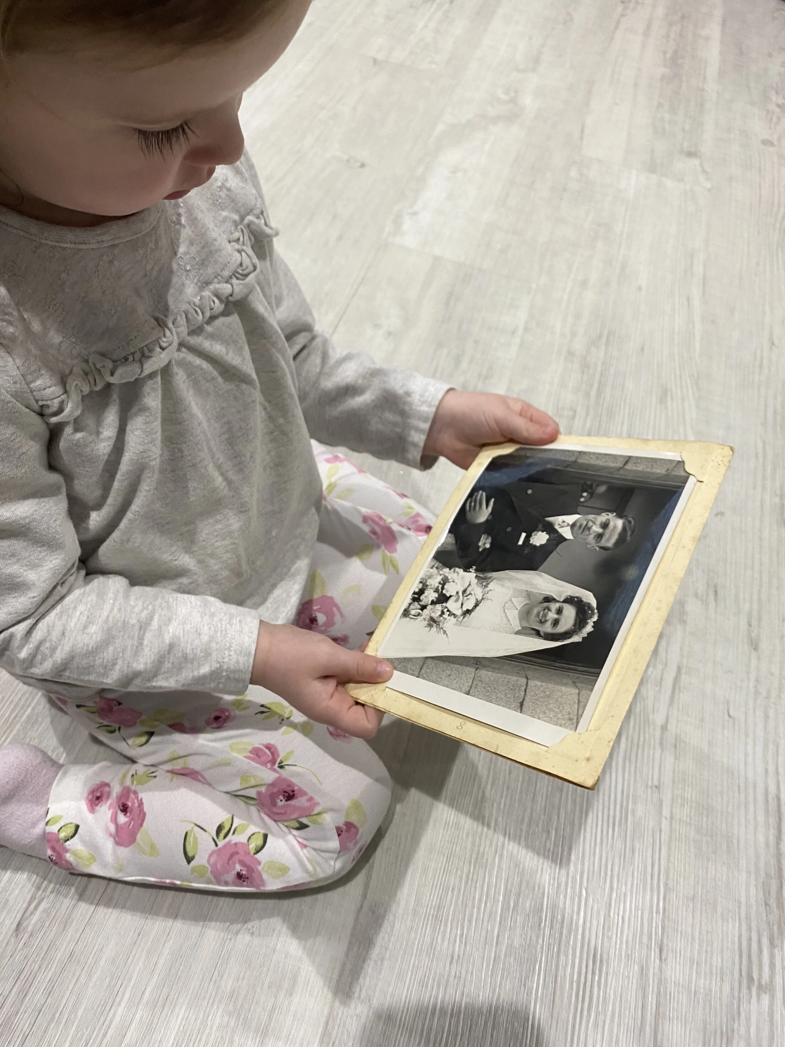 Luna admiring her Great Grunny May &amp; Great Granda Jimmy on their wedding day