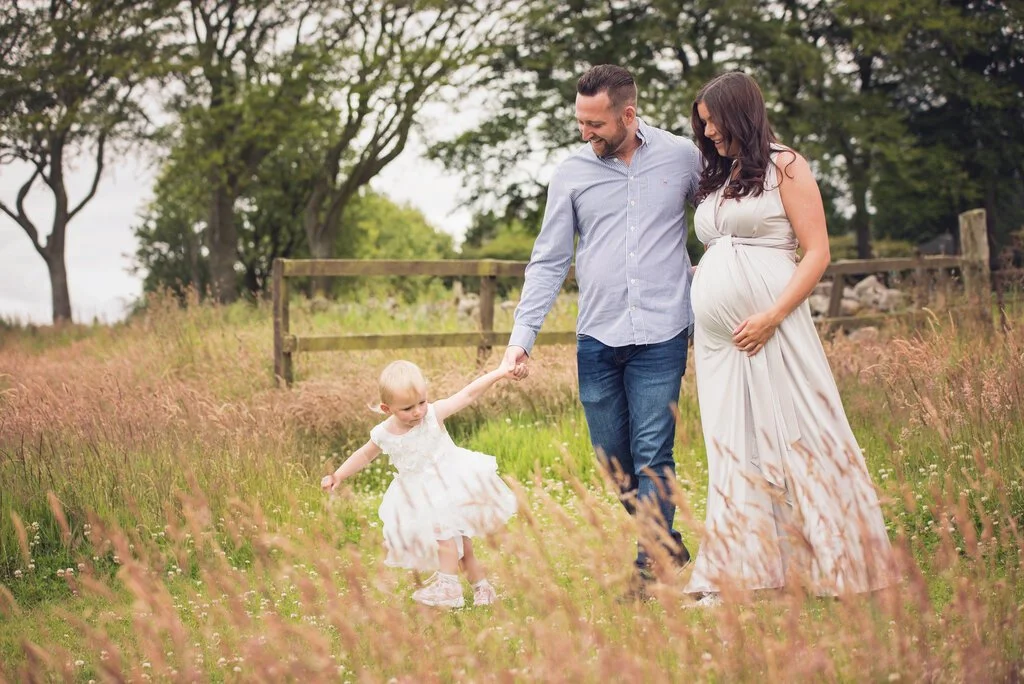 Pregnancy photos with family are a lovely keepsake