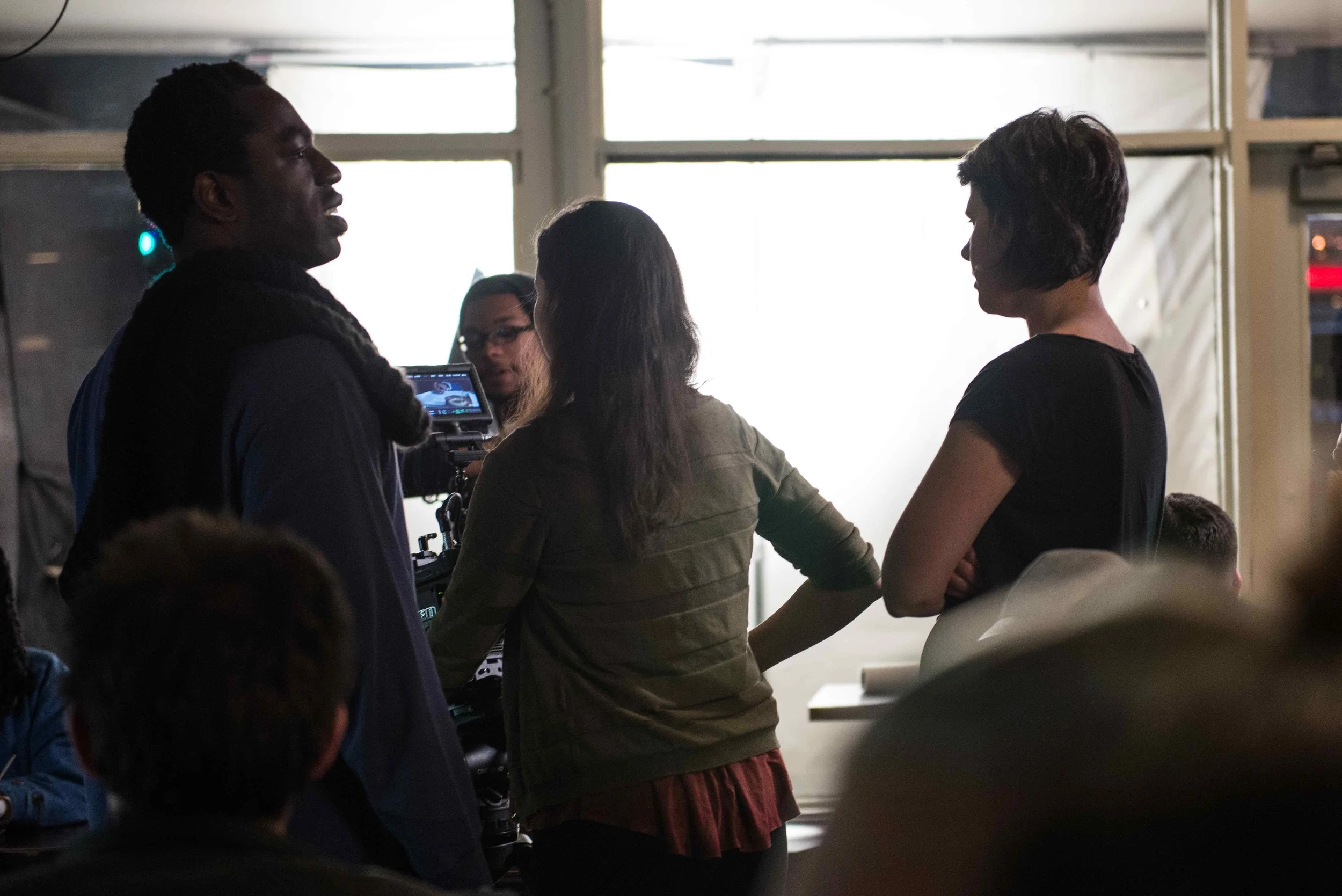 Hans, Lisa and Giovanna consider next steps on set of JAVA the short. Image Dixie D. Vereen.