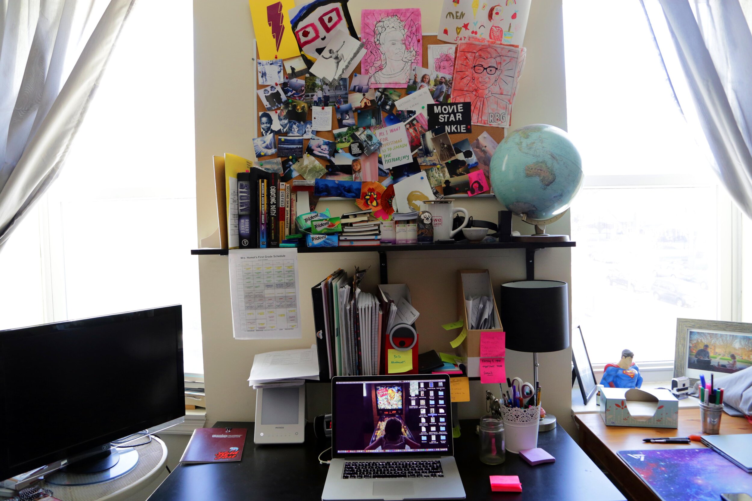 Image by Anonymous of her office desk, with her daughter's virtual learning space to the right.JPG