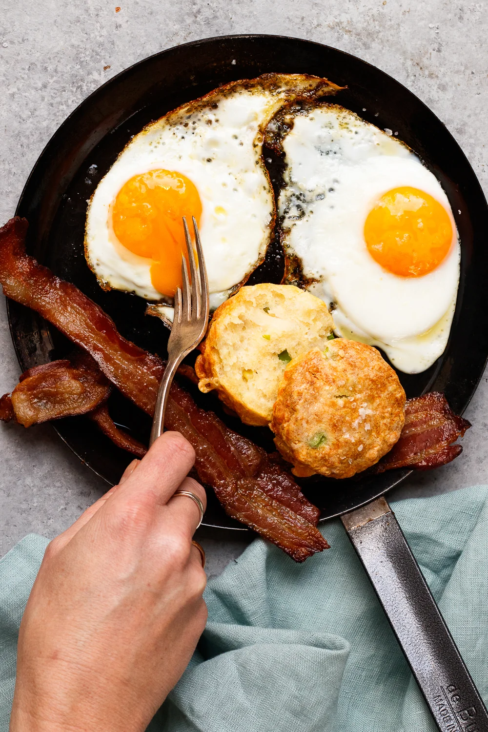 Olive Oil Fried Eggs with Crispy Bacon and Cheddar Scallion Biscuits