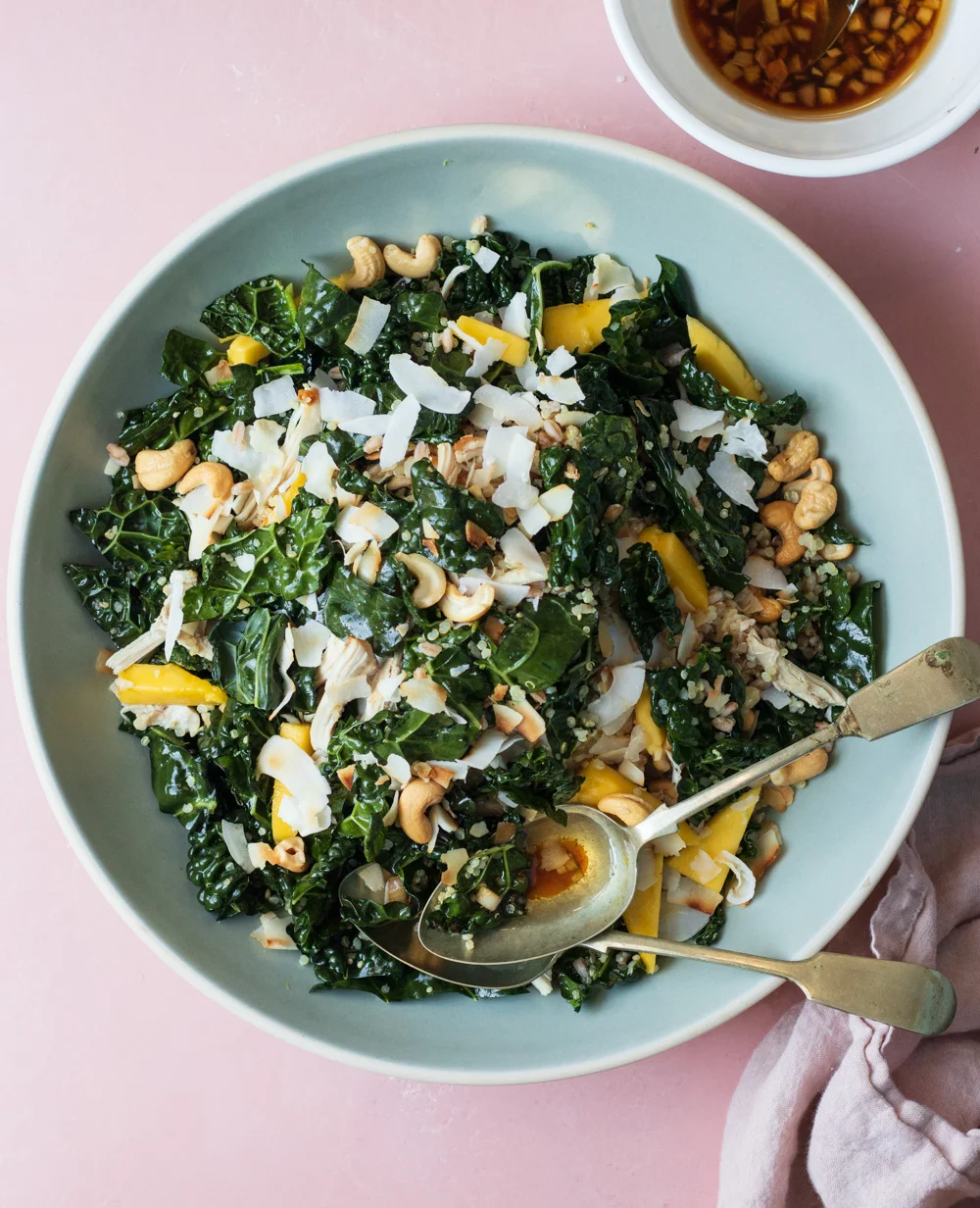 Kale and Chicken Grain Bowl with Toast Coconut and Mango