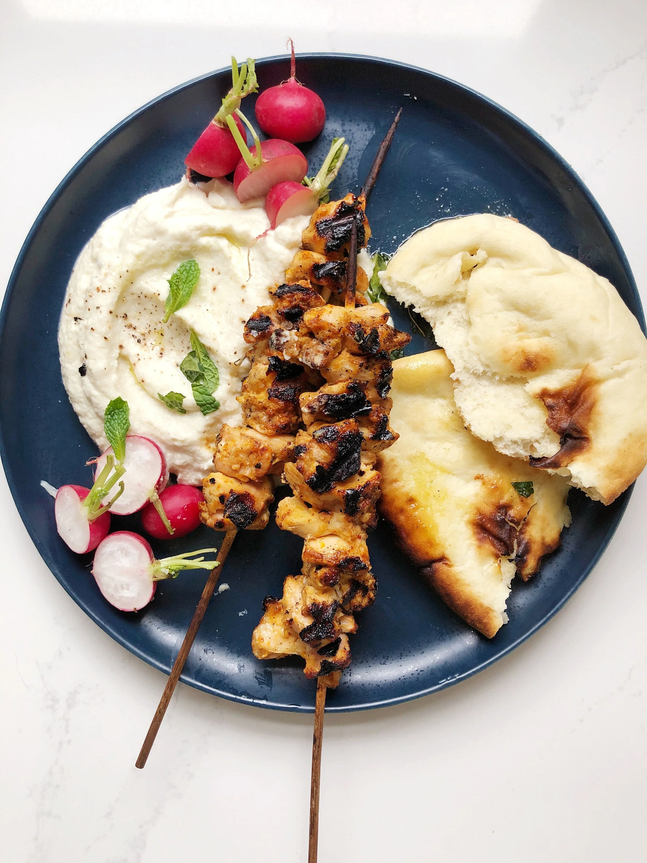 Harissa, Orange, and Yogurt Marinated Chicken with Cauliflower Puree 