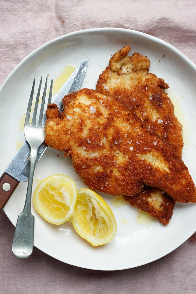 Crispy Parmesan Crusted Chicken Cutlet  with a Kale Caesar Salad 