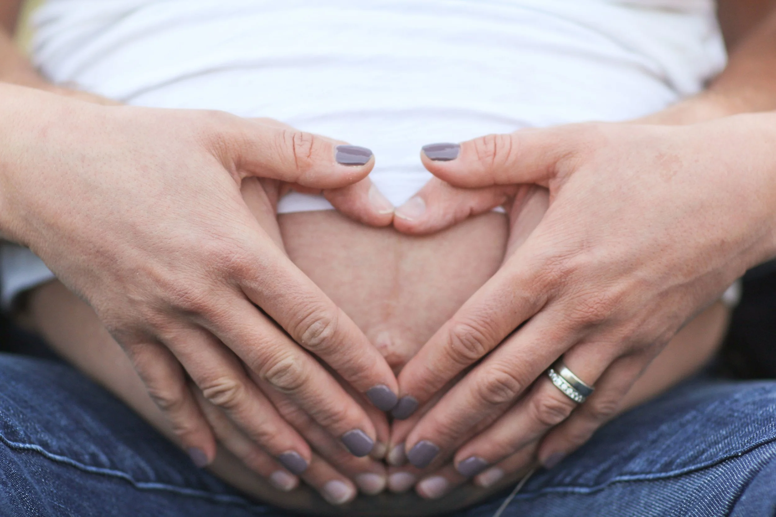 both of us heart hands belly.jpg