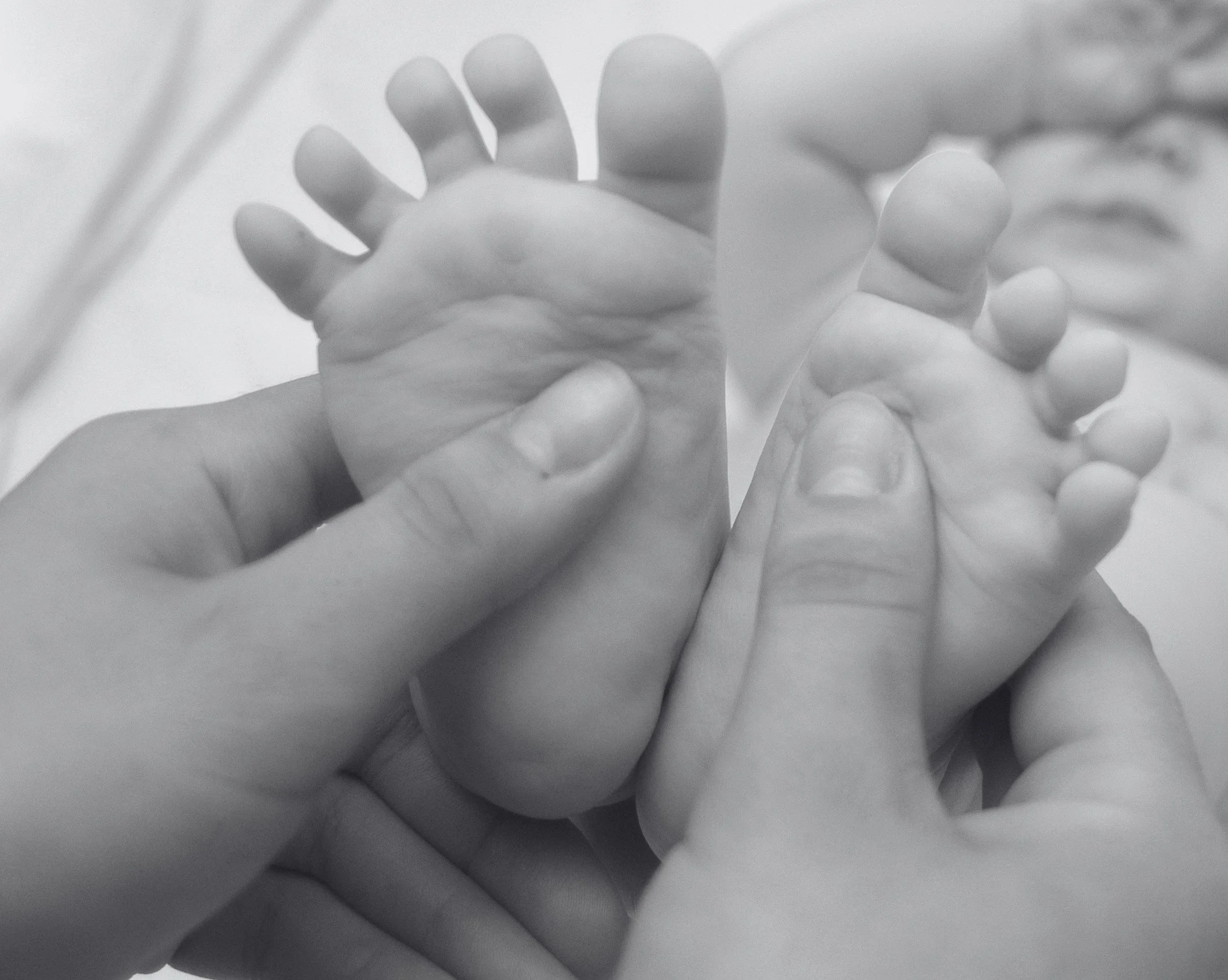 BW baby feet for website.jpg
