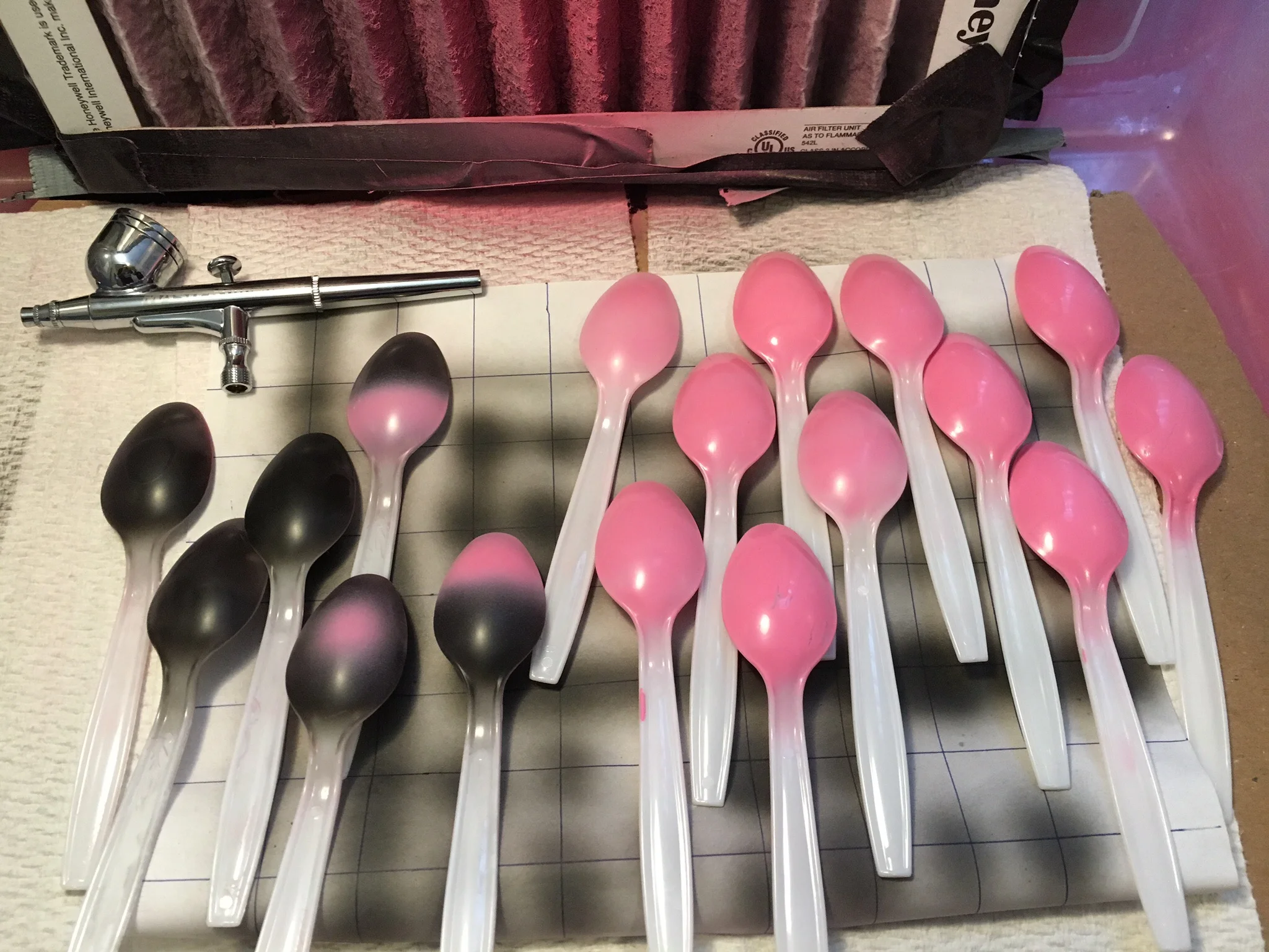 Practicing on plastic spoons. Look at that pink!!!!
