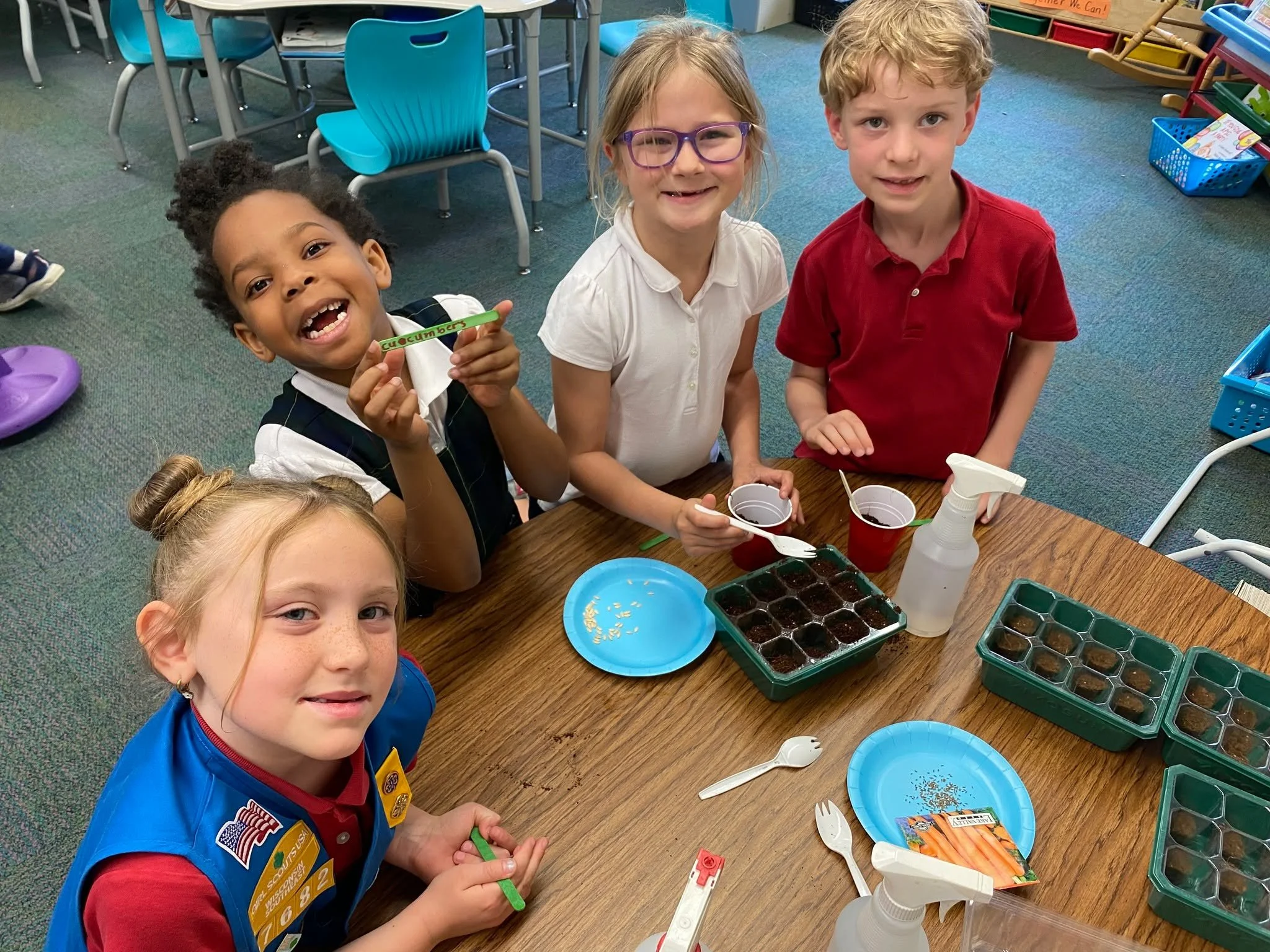 First graders planted seeds for Earth Day which will spend the summer blooming in our school garden! 🌎