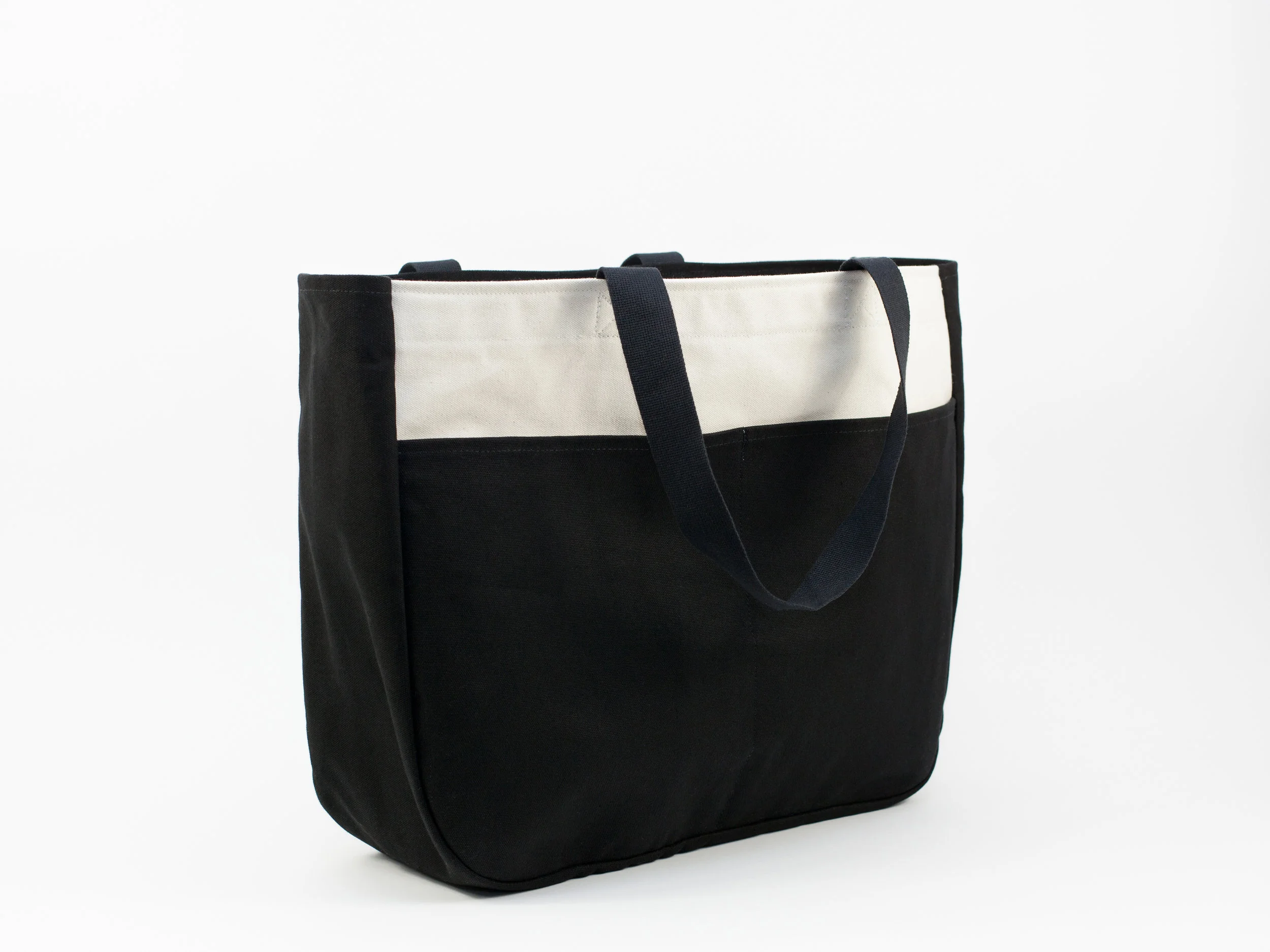 Blk_Pine_Standard_Canvas_WideTote_NaturalBlack_angled side.jpg