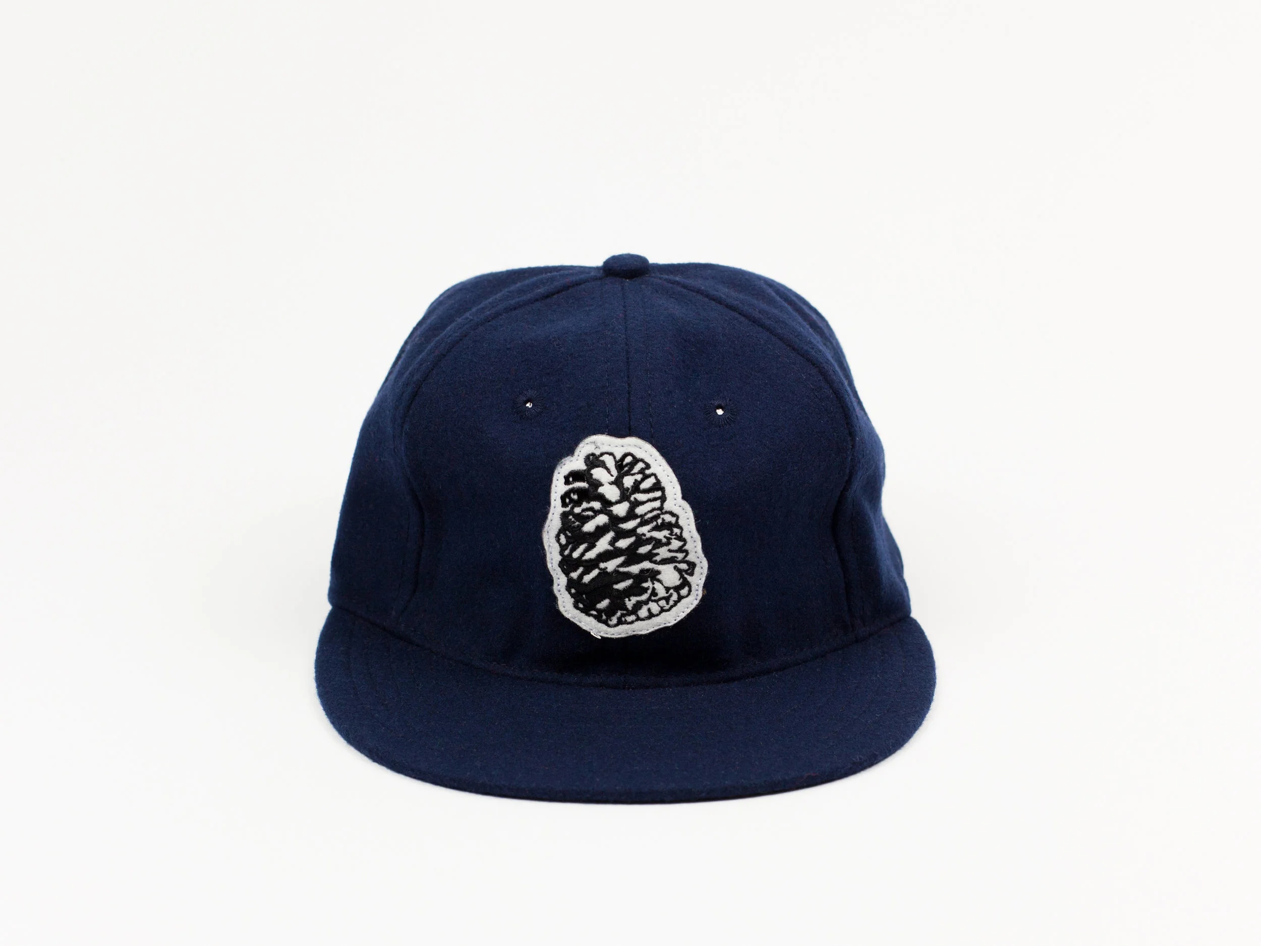 Blk_Pine_Ballcap_Pinecone_Navy_front.jpg