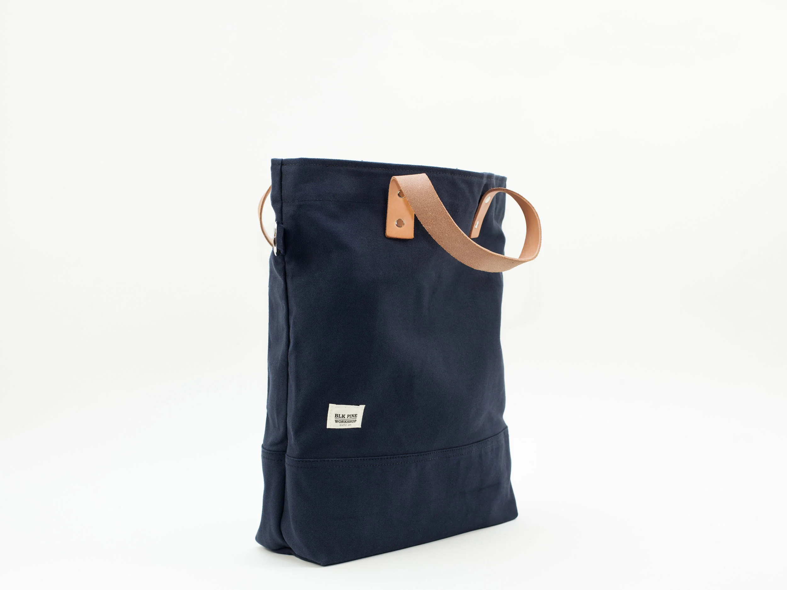 Blk_Pine_Classic_Leather_Canvas_TallTote_Navy_angledside.jpg