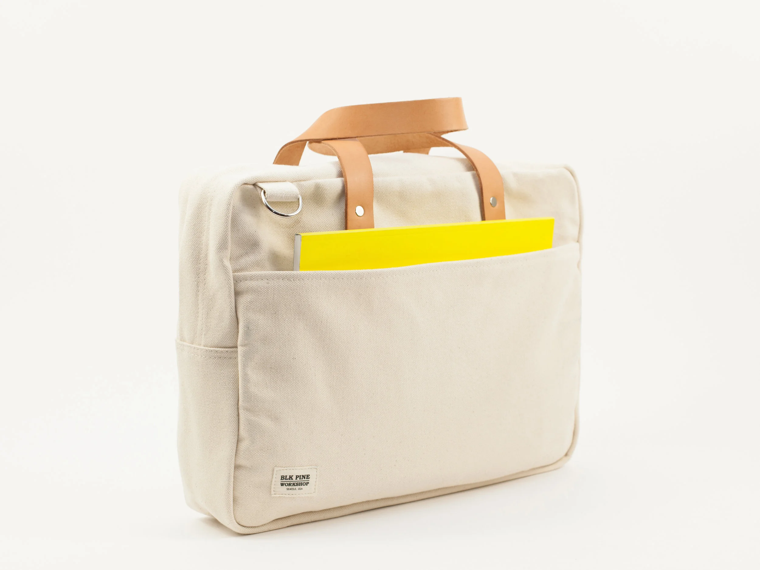 Blk_Pine_Classic_Leather_Canvas_Briefcase_Natural_angled side 2.jpg