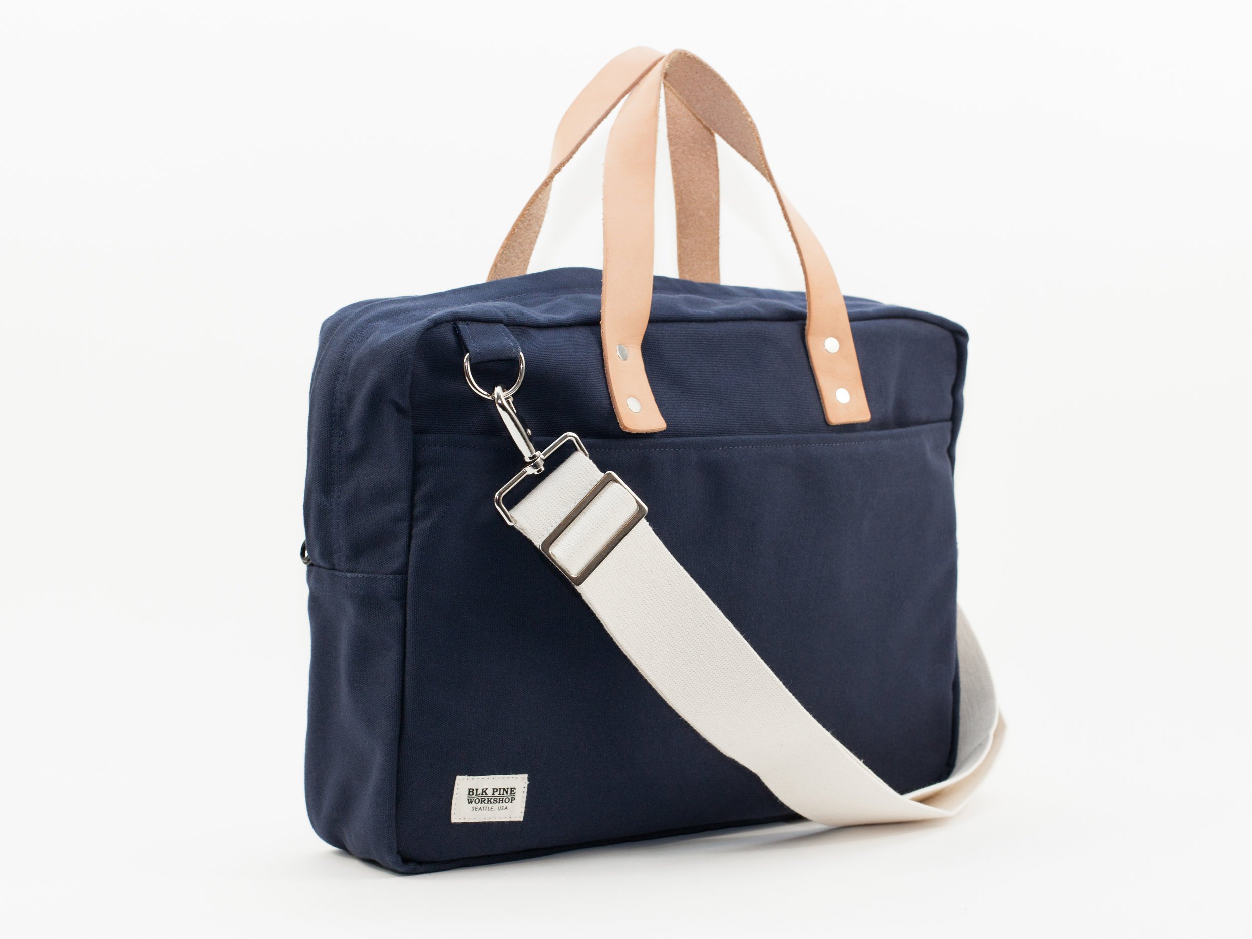 Blk_Pine_Classic_Leather_Canvas_Briefcase_Navy_angled side.jpg