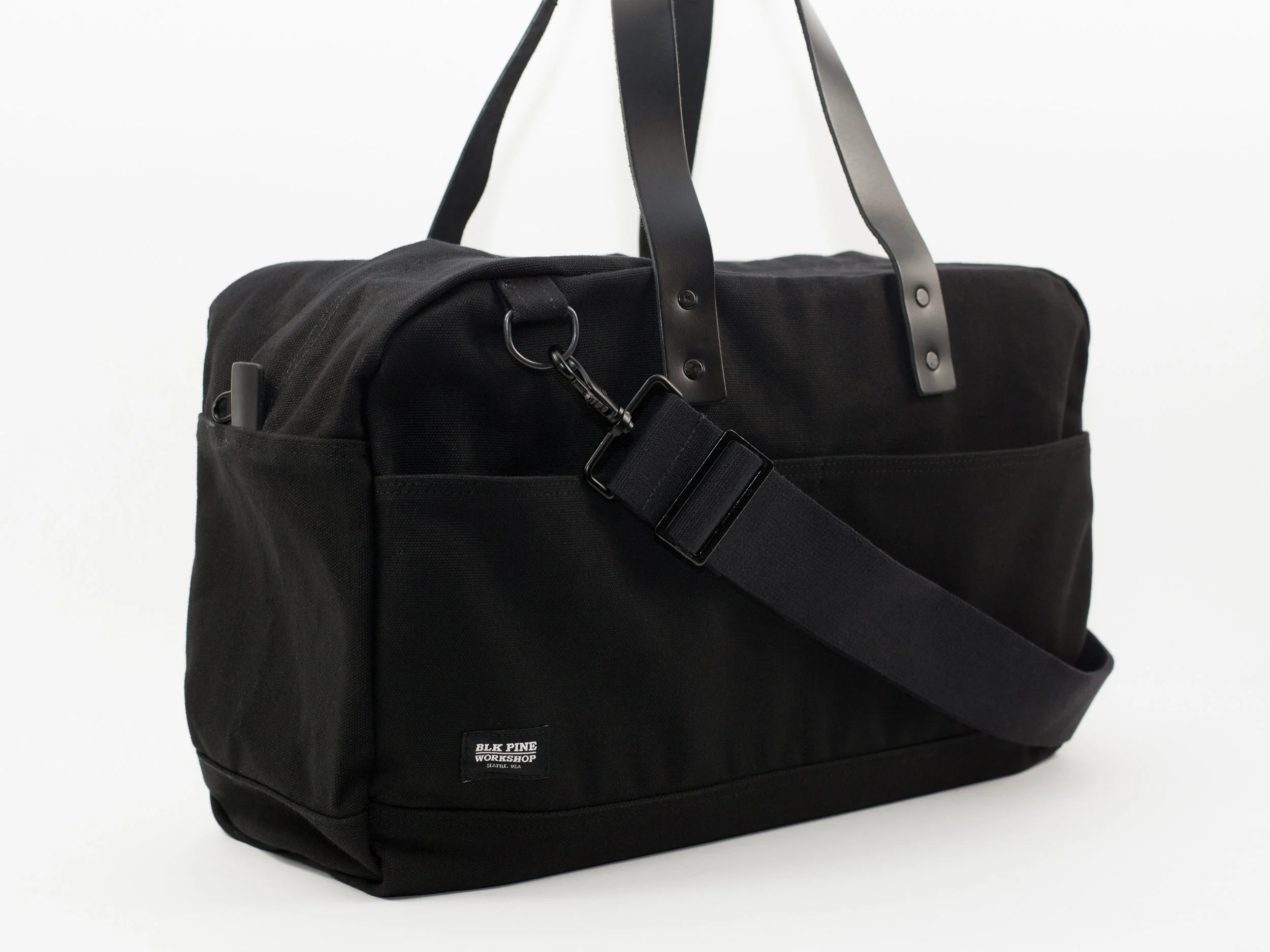 Blk_Pine_Classic_Leather_Canvas_Weekender_Black_angled side.jpg