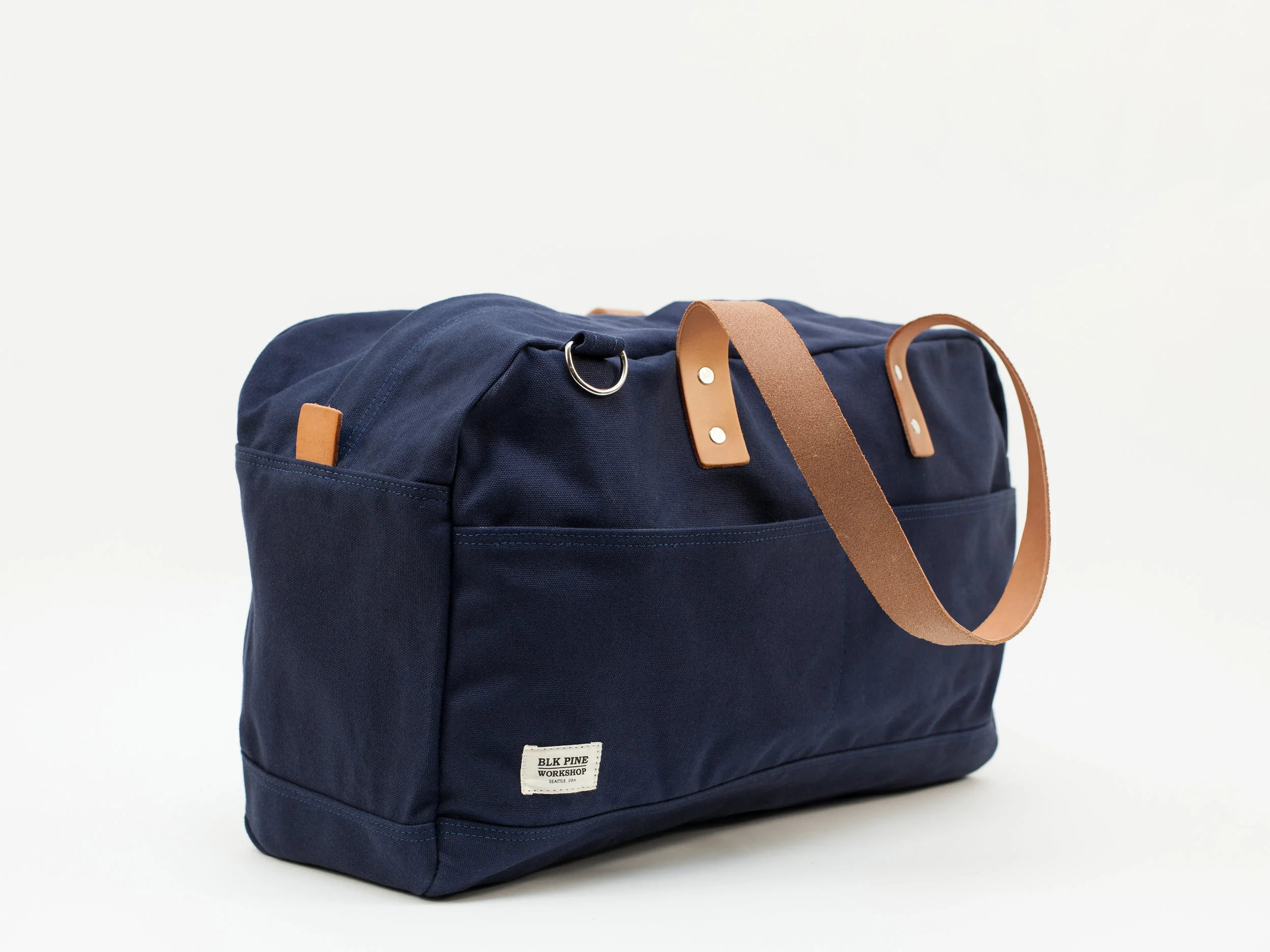 Blk_Pine_Classic_Leather_Canvas_Weekender_Navy_angledside.jpg