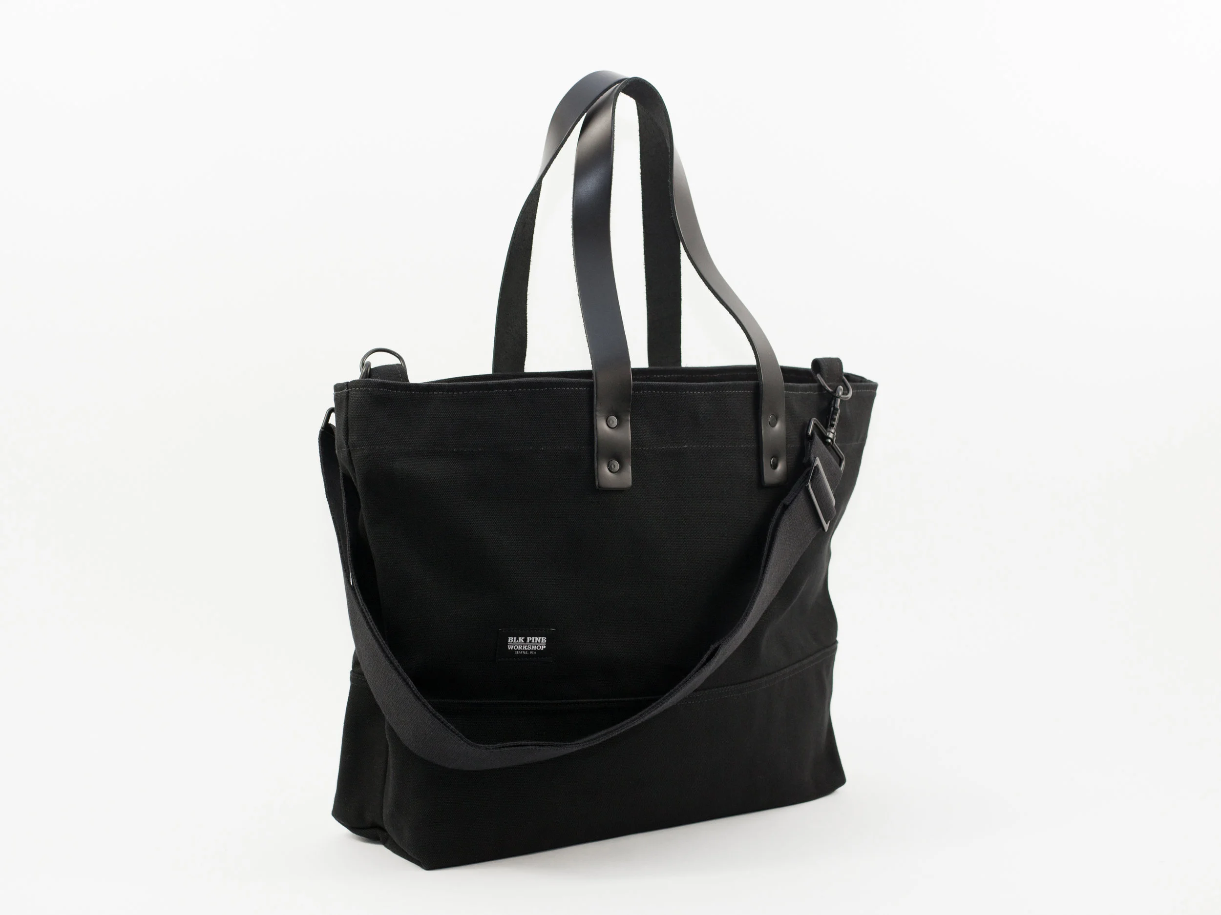 Blk_Pine_Classic_Leather_Canvas_MediumTote_Black_angled side.jpg