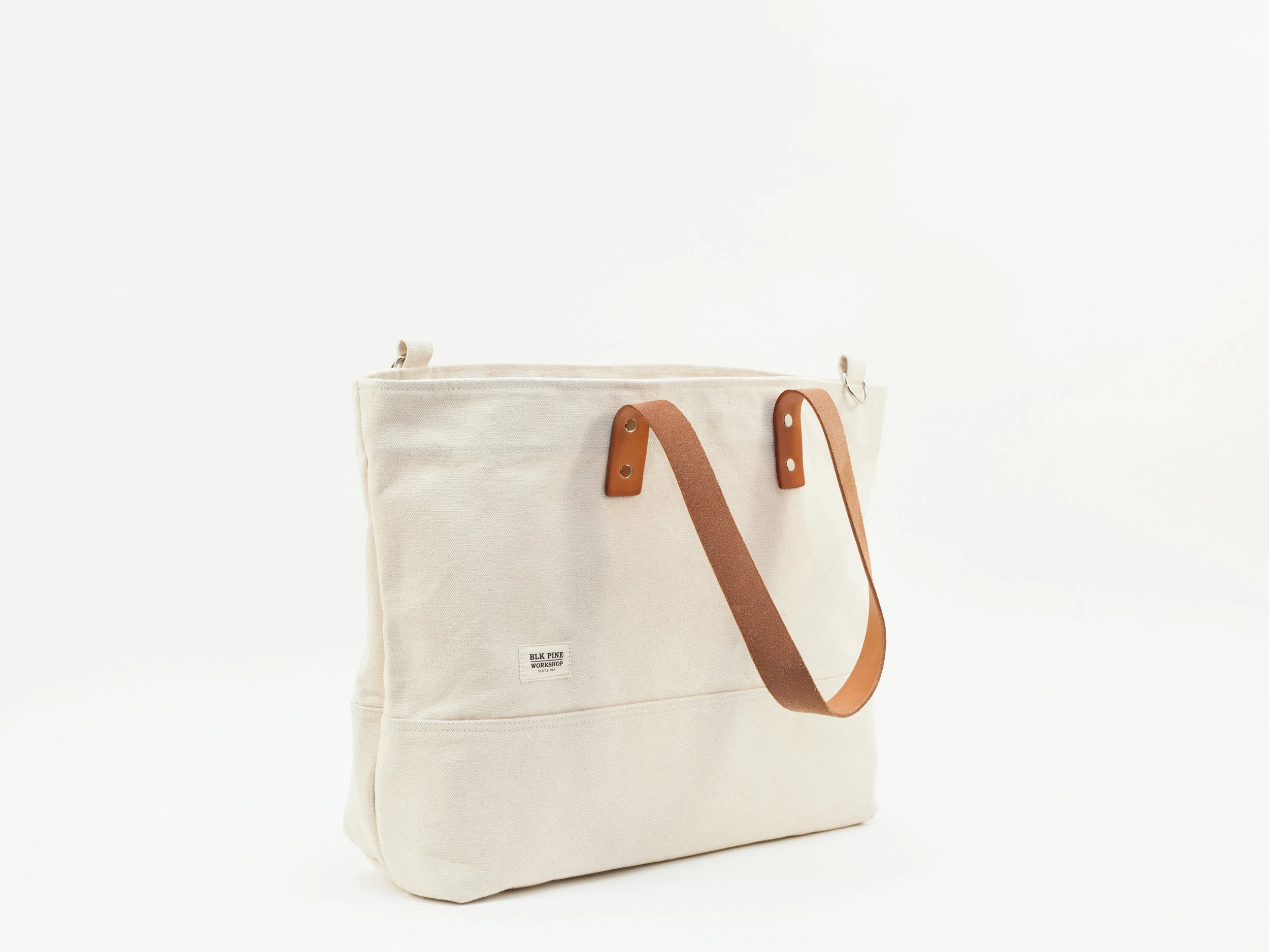 Blk_Pine_Classic_Leather_Canvas_MediumTote_Natural_angledside.jpg