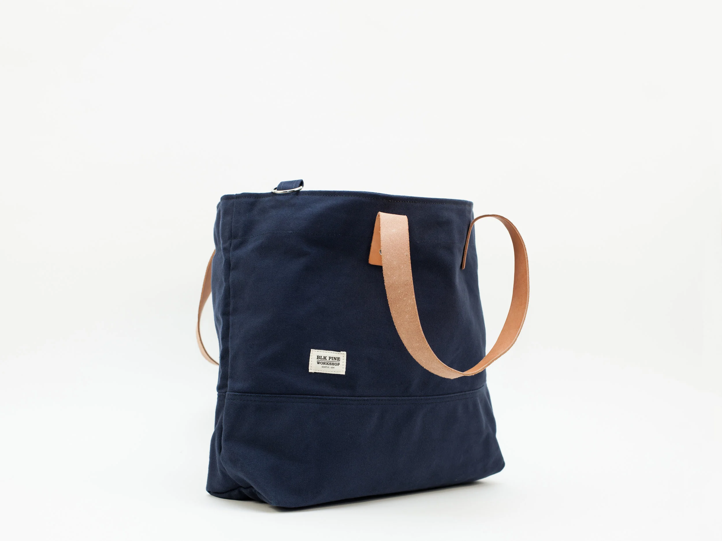 Blk_Pine_Classic_Leather_Canvas_MediumTote_Navy_angledside.jpg