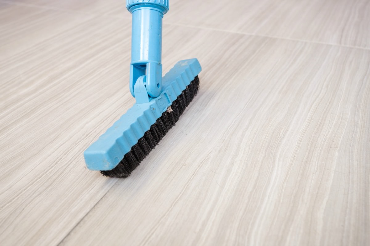 Cleaning tile with nylon brush | MrsGrout.com