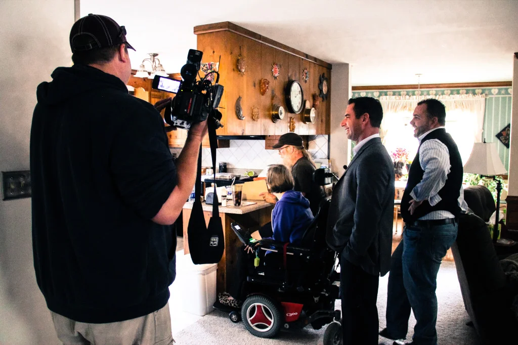Matt Marek and Heath Pond from Good Neighbor discuss renovation plans with Lisa & Scott.