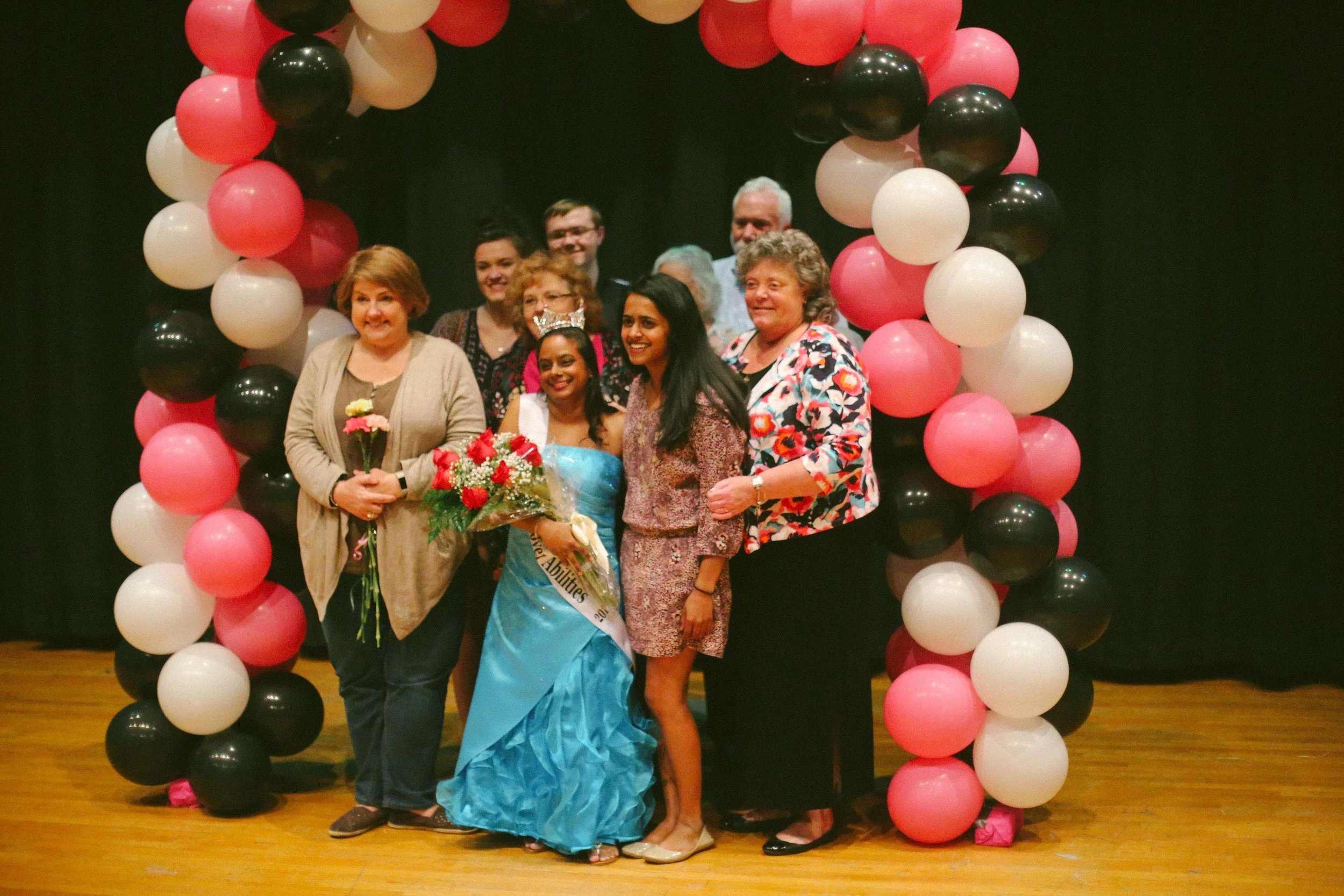 Sarah poses with her family after being crowned the first ever Miss Hanover Abilities