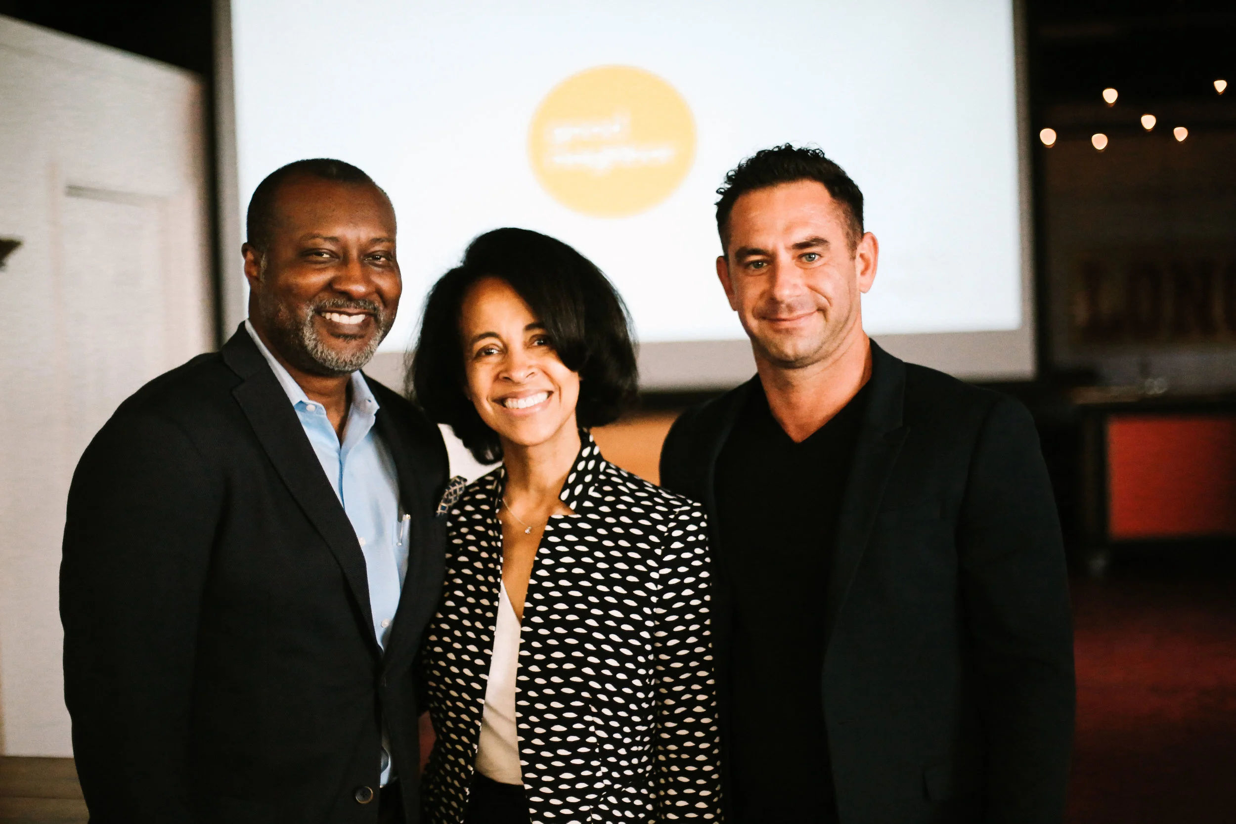 B.K. and Jacquelyn pose for a photo with Matt Marek, Executive Director at Good Neighbor
