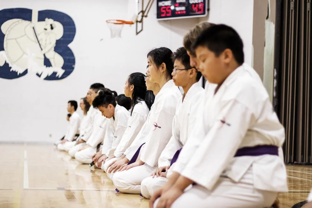 Students meditating at the end of class at Mind Over Matter Karate in North York, Toronto, On