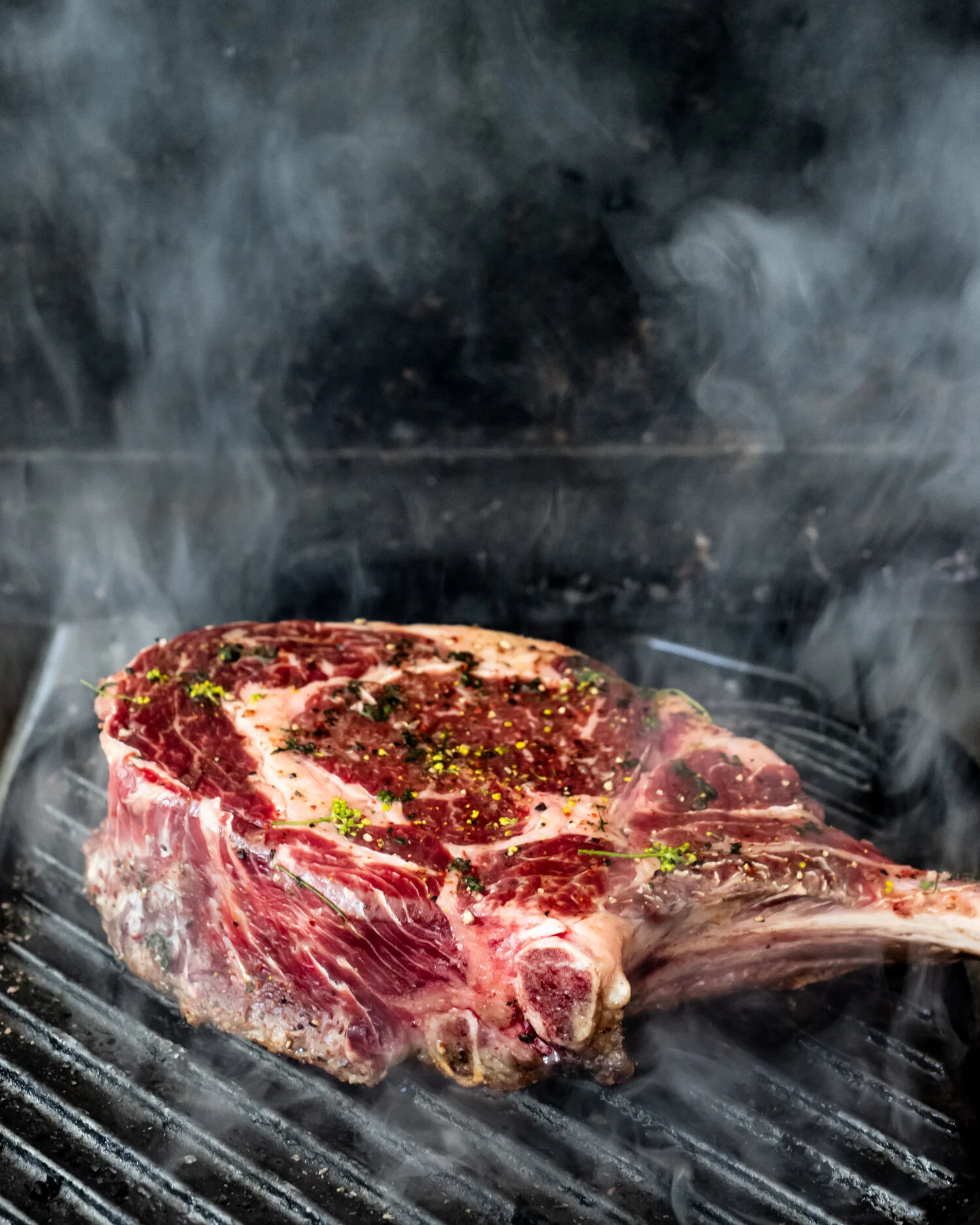 erin-scott_san-francisco-california-food-photographer-natural-light-editorial-tomahawk-steak-on-grill-smoke-georgedolese_may2019-1816.jpg