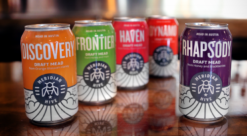 Five Flavors of Draft Mead in Cans lined up at a bar.png