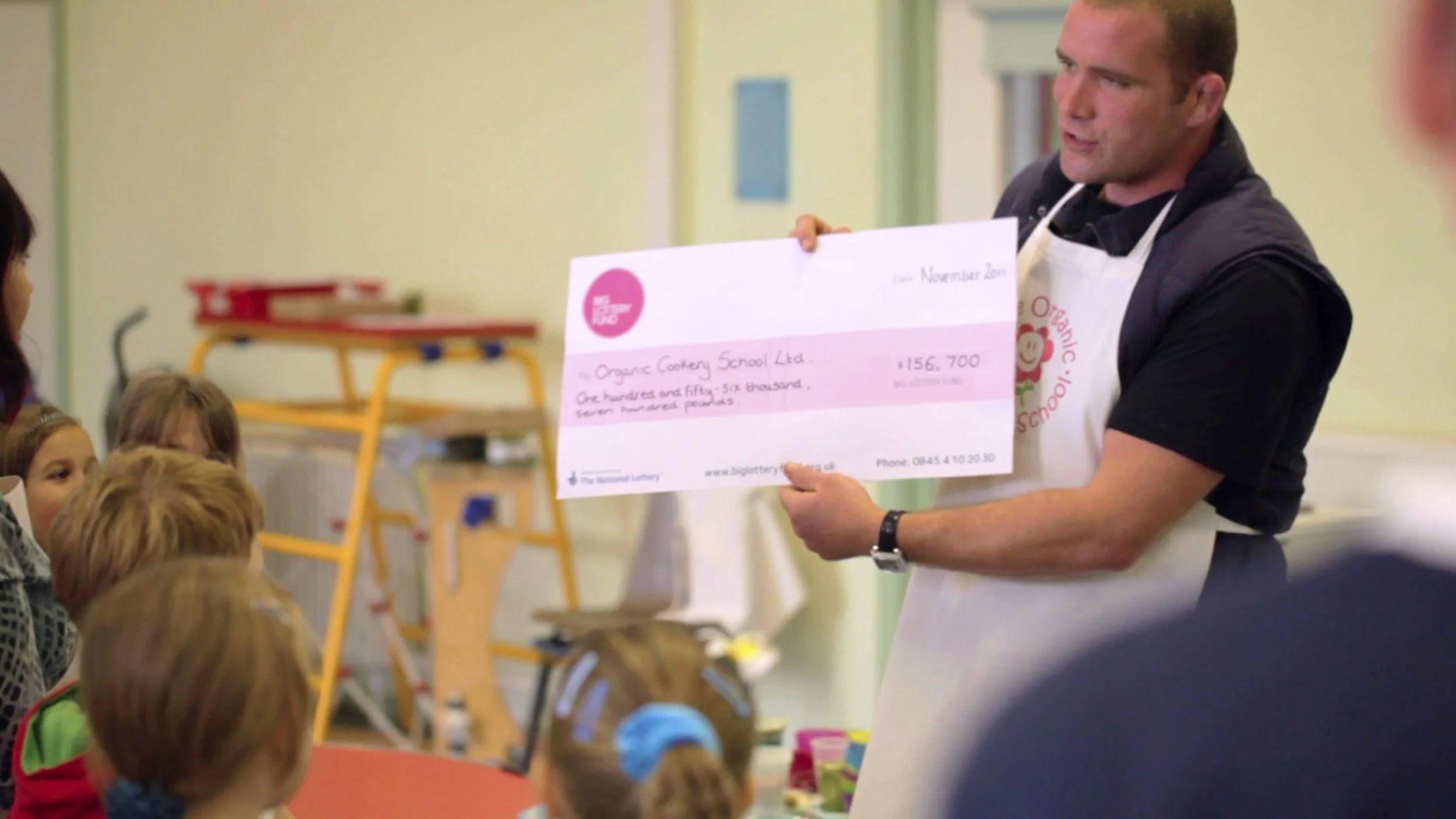 Receiving a cheque from the BIG Lottery for our Cooking With Dad programme.