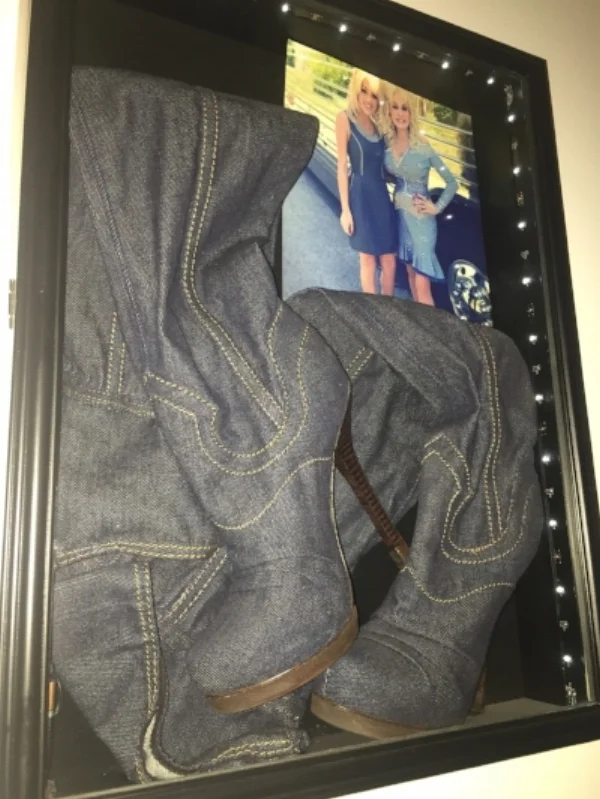Last but not least, I couldn't write a blog about boots without including my boots that Dolly gave me. These are definitely one of my most prized possessions and one of the coolest gifts I've ever received. I will never forget the day I got to wear these and when I went to give them back to Dolly's stylist, Dolly said "Oh honey, just keep 'em!" I thought I had died and gone to country music heaven. It would take a very, very special occasion for me to take these out of their shadowbox and wear them.