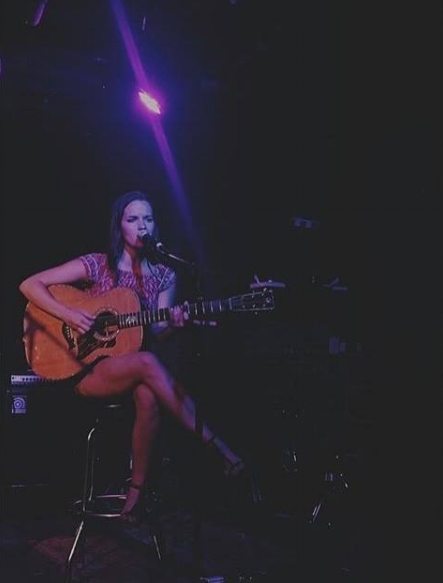 Performing at one of YEP's Songwriter Nights at the Basement. 