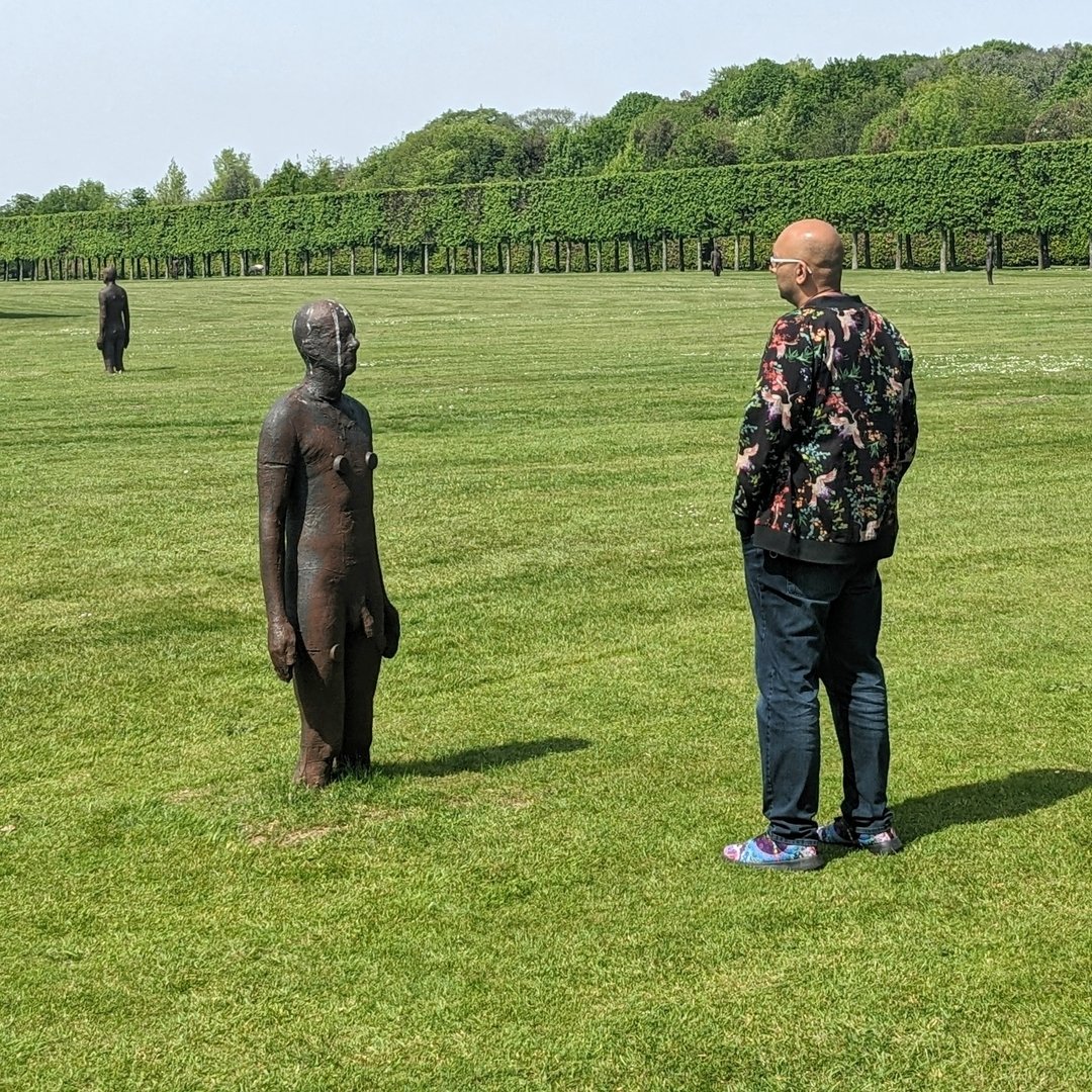 Bodies coming out of the ground, bodies in the ground, and bodies above the ground on concrete columns. Antony Gormley's 100 life sized sculptures have been placed all around Houghton Hall in Norfolk &mdash; breaking up the landscape of the managed g