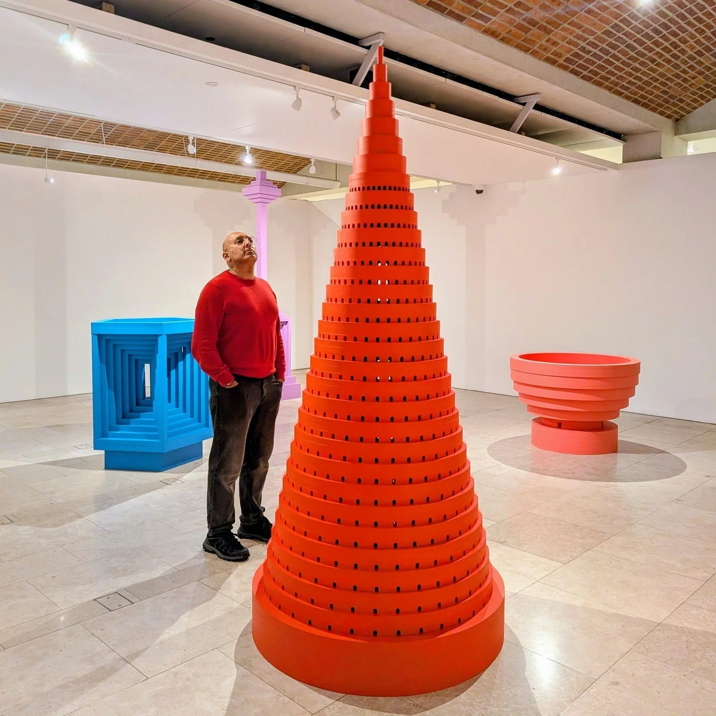 A bright blue lamppost in the gallery feels like it&rsquo;s been brought in off the street and given a fresh lick of paint. Look a little closer and you&rsquo;ll see tiny people at the base and within the lamp. That&rsquo;s when the light goes off in