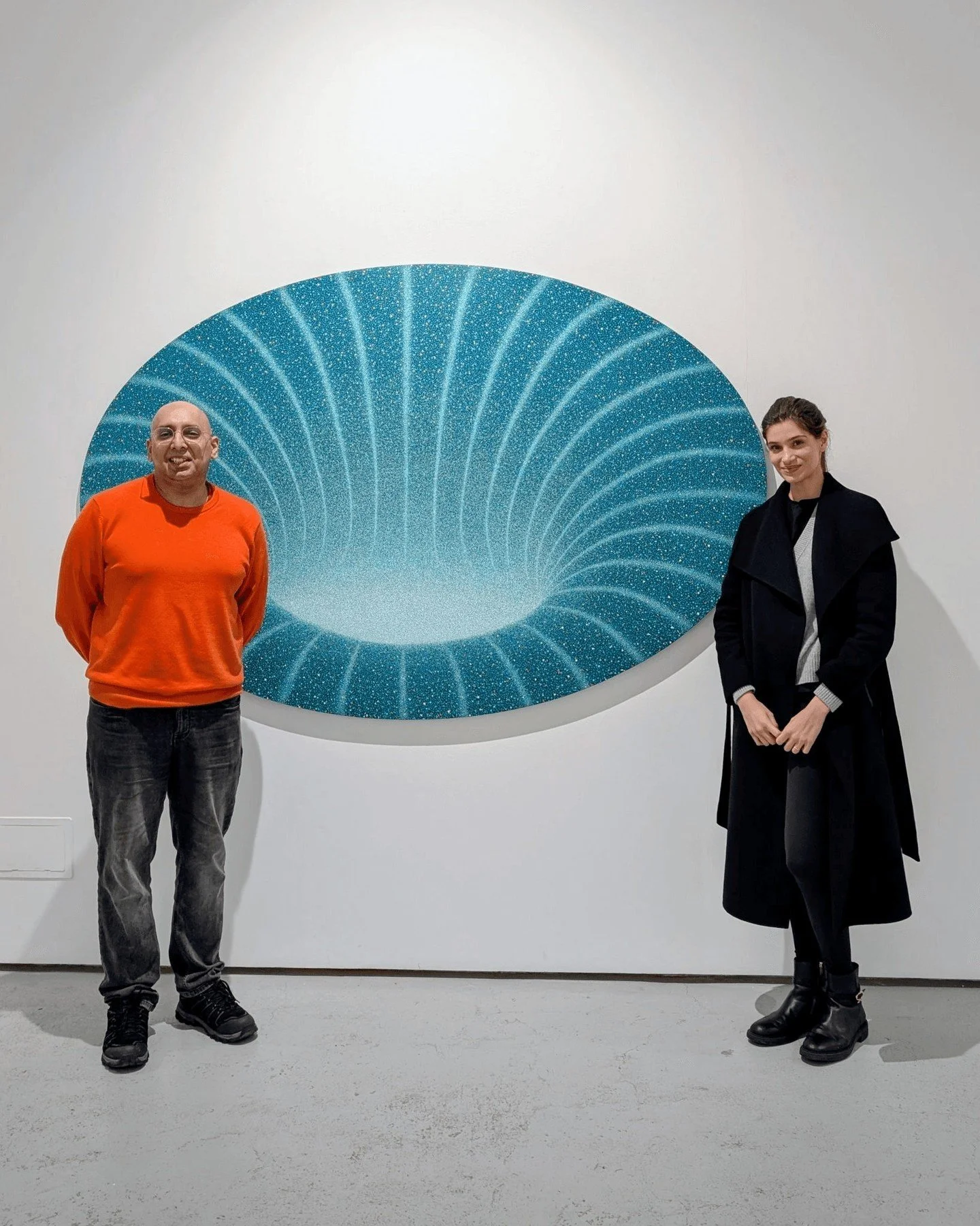 From a distance, these works look like galaxies or wormholes, mappings of data or visualisations of sound that pull you in with their depth. Get up close, and you see they are made up of lots of dots in the style of the Pointillists, creating an opti