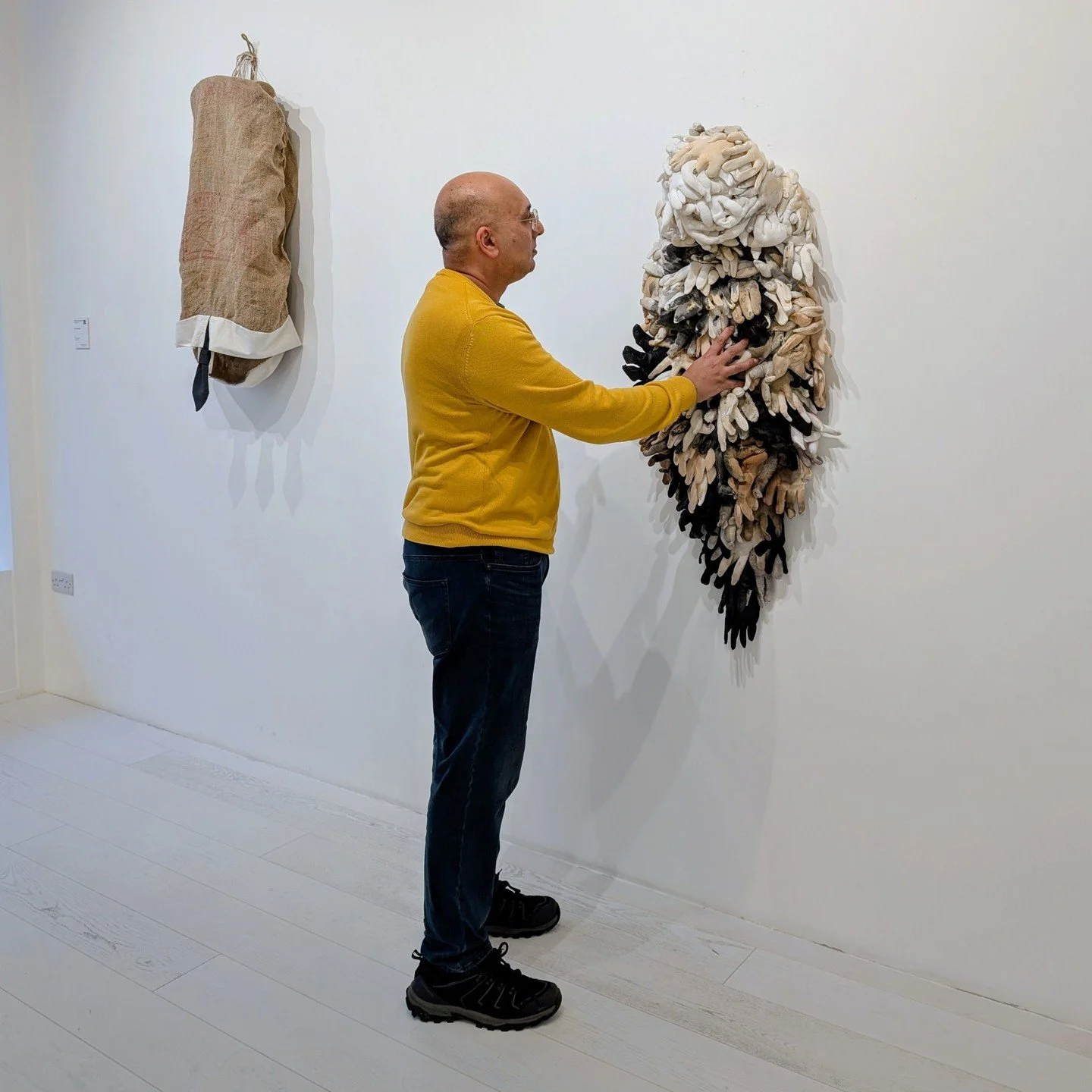 We often associate soiled and discarded clothing with times of war and tragedy, but in Kari Anne Helleberg Bahri&rsquo;s hands, they become joyful works. We&rsquo;re encouraged to get hands-on with work made from gloves, touching them with our own ha