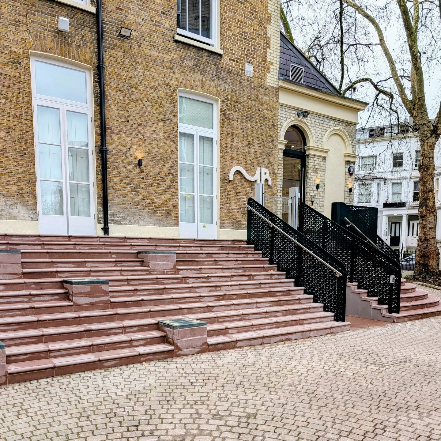 On the corner of the intersection of two major roads, and a short walk from Earl&rsquo;s Court station, is not where you&rsquo;d expect to find an arts venue. Yet, that&rsquo;s where Mosaic Rooms has been based; it&rsquo;s a space that supports and a