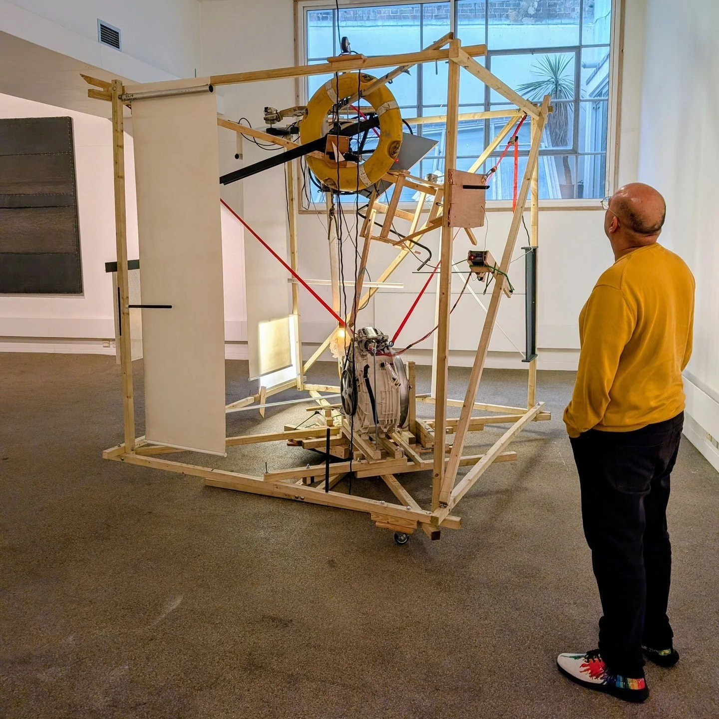 This exhibition is a tribute to the post-modern architect who once lived above the gallery space, and in keeping with his style, it includes artists who step outside art and architectural norms. Zayd Menk&rsquo;s spinning installation, powered by a w
