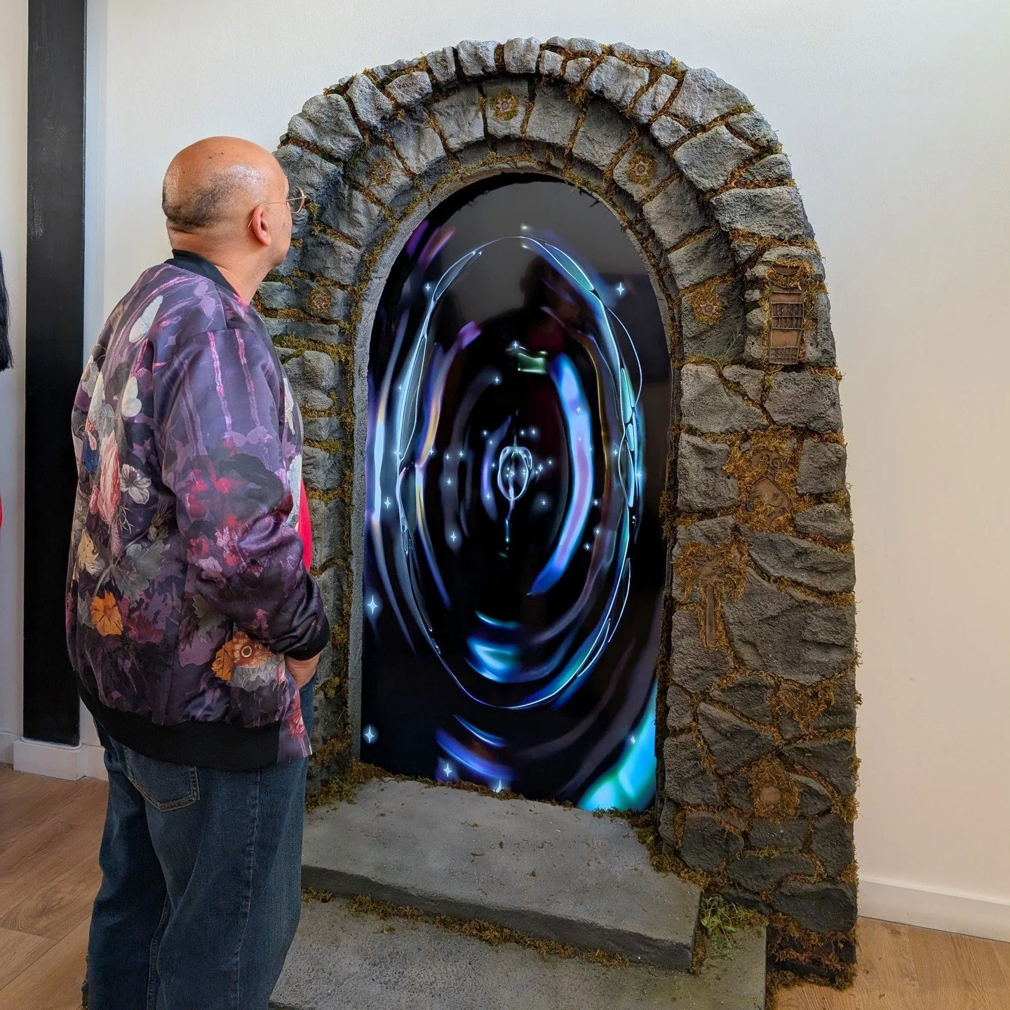 A portal appears in the gallery. Dare we step through it? Where will it lead? Hands and stars appear across the walls, mysterious figures appear in a work on paper and a smaller piece is framed by cherubs. Welcome to Zayn Qahtani&rsquo;s fantastical 