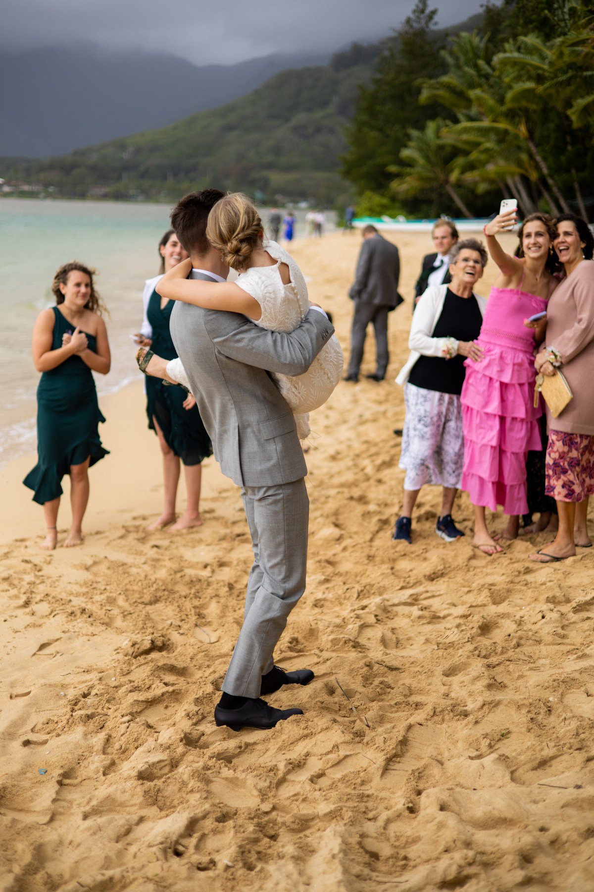 bride and groom pose for pictures