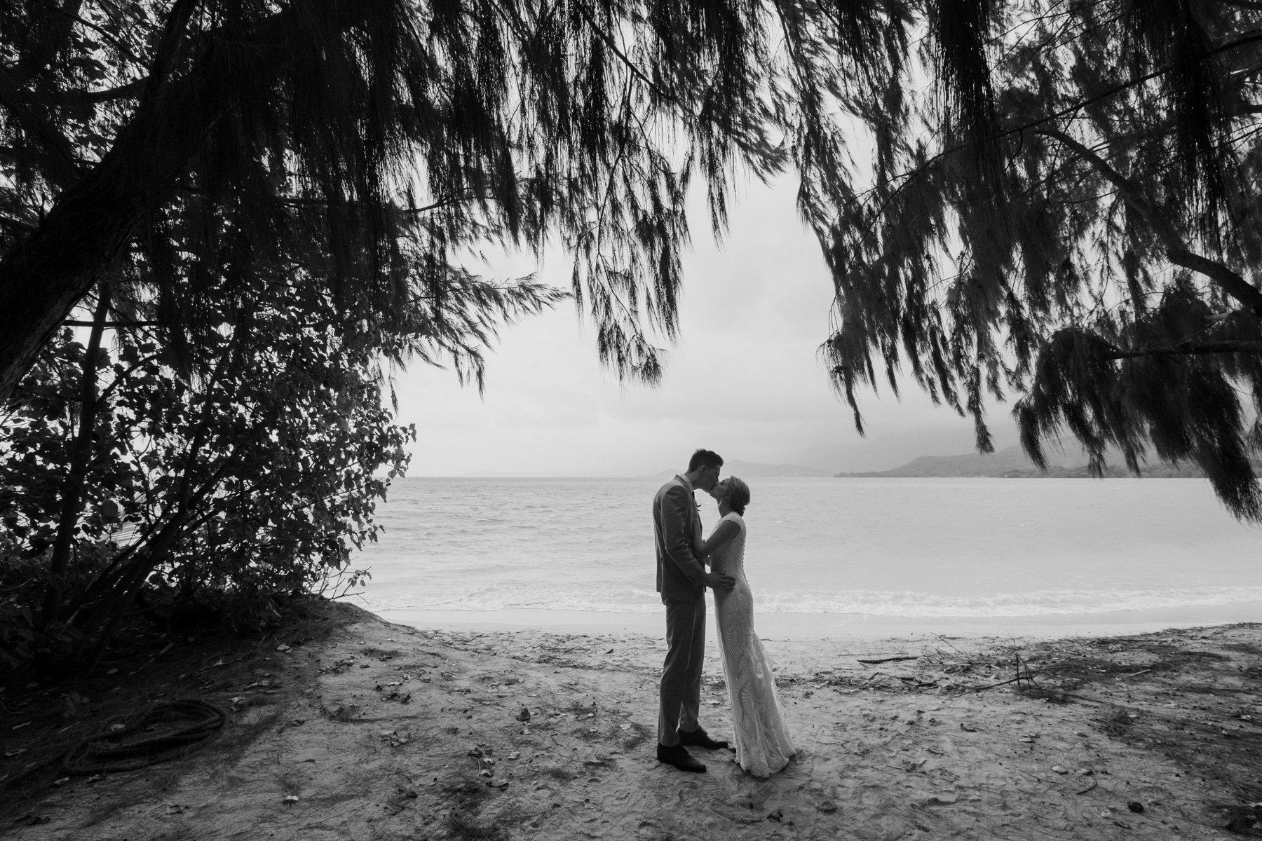 romantic kiss by the beach