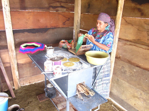 Once the stove is installed the villagers are able to cook in clean air!