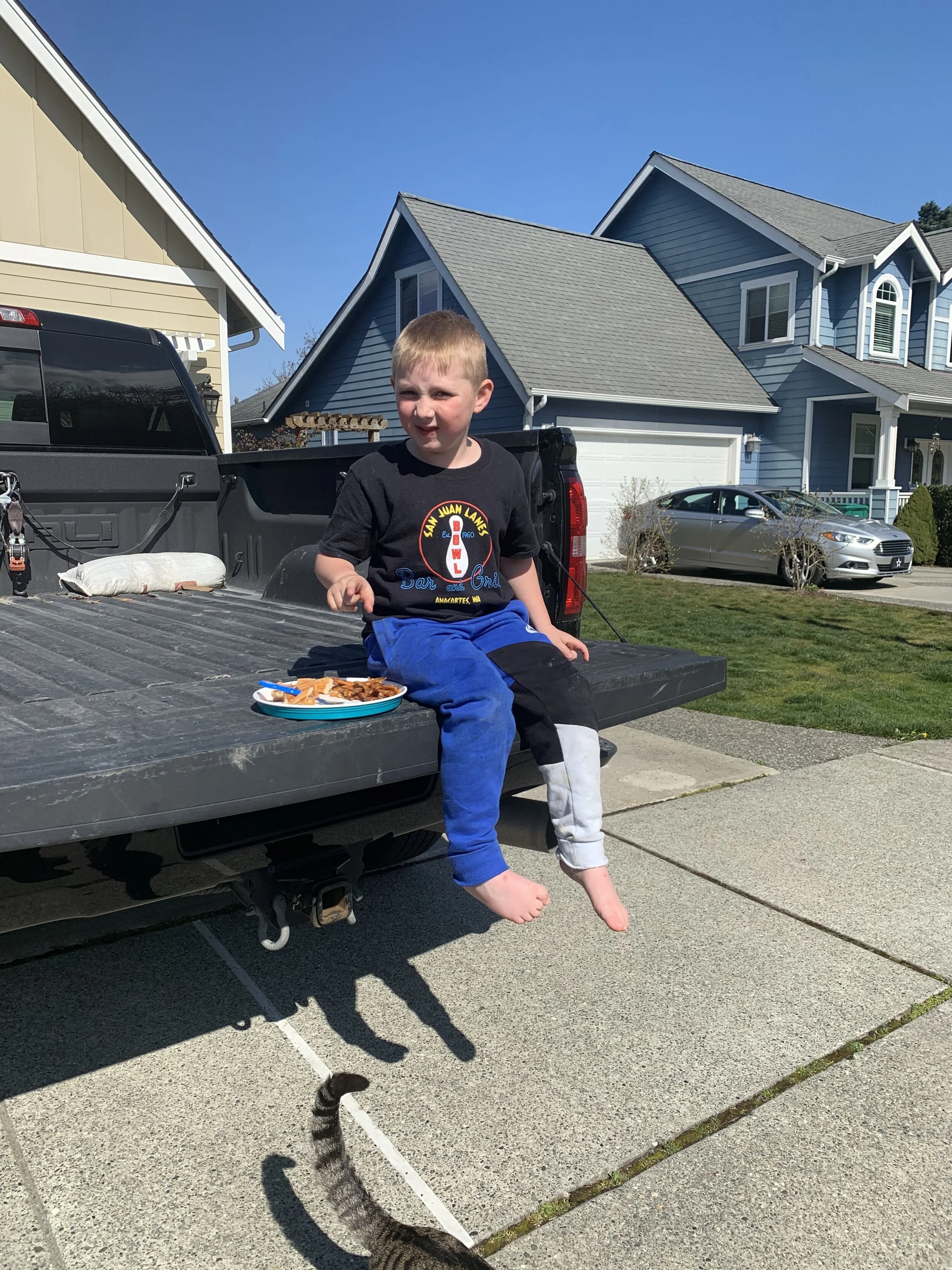 Evan enjoying his waffle and some fries!