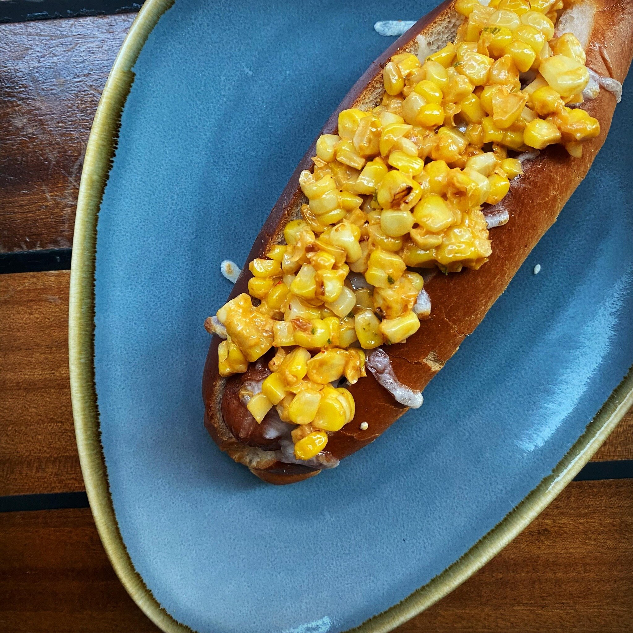 Not to be corny 🌽 but this wiener is a whole spring break in a bun. Chef @kathrynbritten is serving it up STREET CORN style with a chipotle aioli and cotija cheese. Only on #weinerwednesday at the #wineshack ;) #eloteincluded #lifesabeach #beachyouk