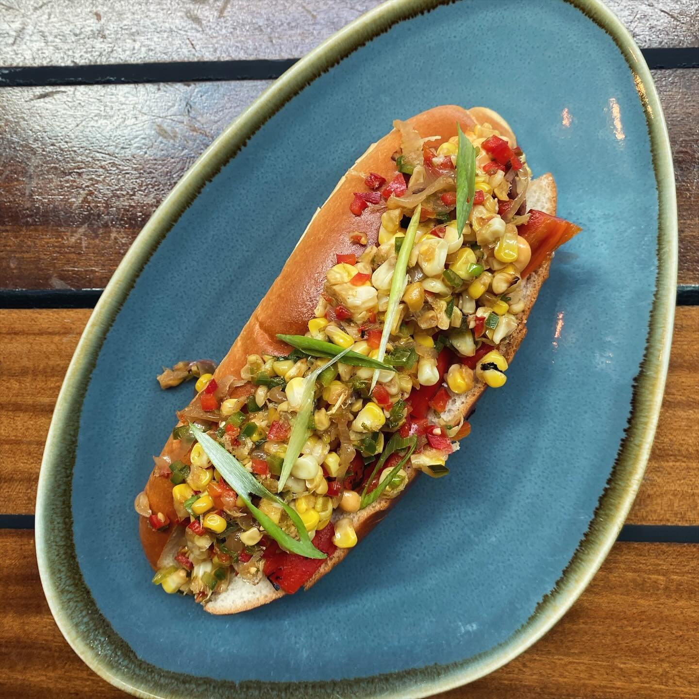 Calling all takers 😘 This summer-spectacular #weinerwednesday is inspired by the iconic @chappellroan song THE GIVER. With chipotle aioli, country corn relish, and scallions, this one is a little spicy, a little sweet, and 💯 ready to get the job do