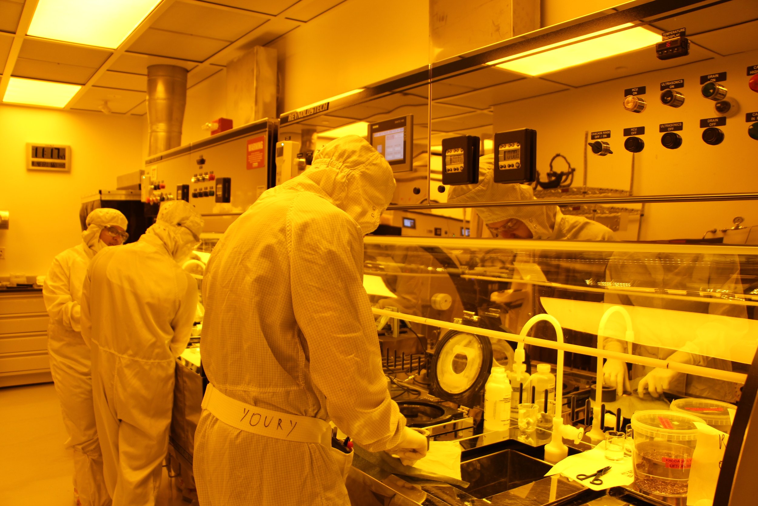 Cleanroom users working in the photolitography area in the CNI cleanroom. 