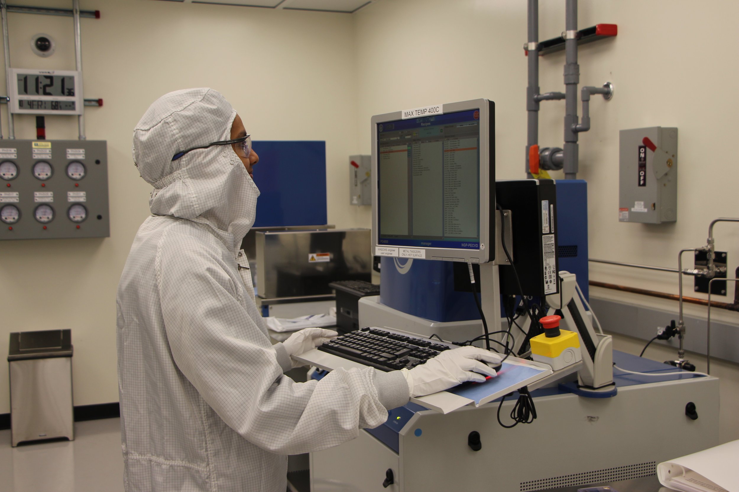 A cleanroom user working in the CNI cleanroom, using our reactive ion etching. 
